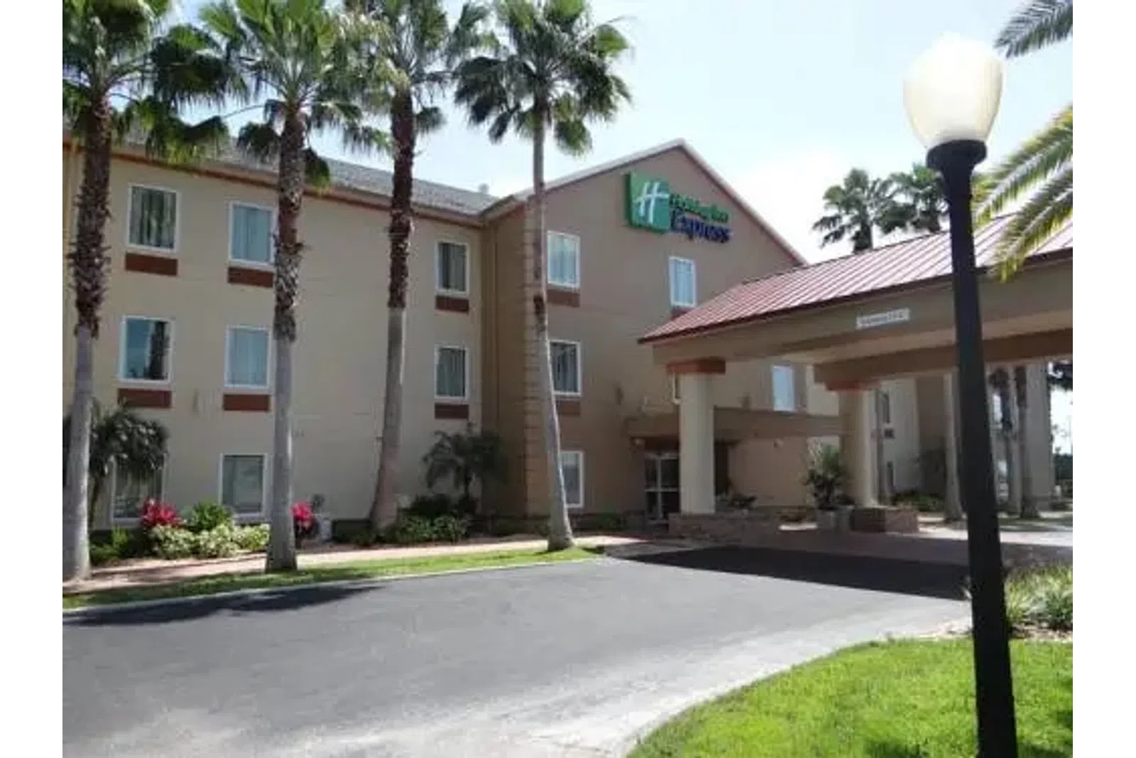 a building with palm trees