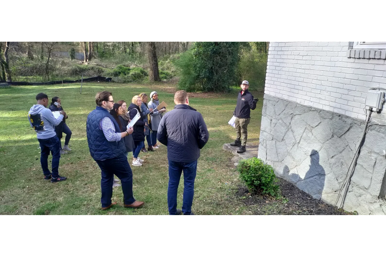 a group of people standing outside