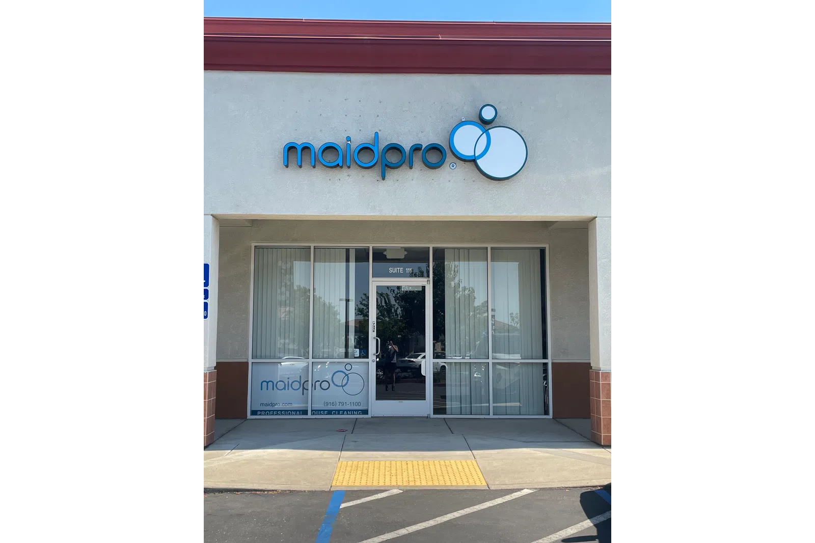 a store front with a sign