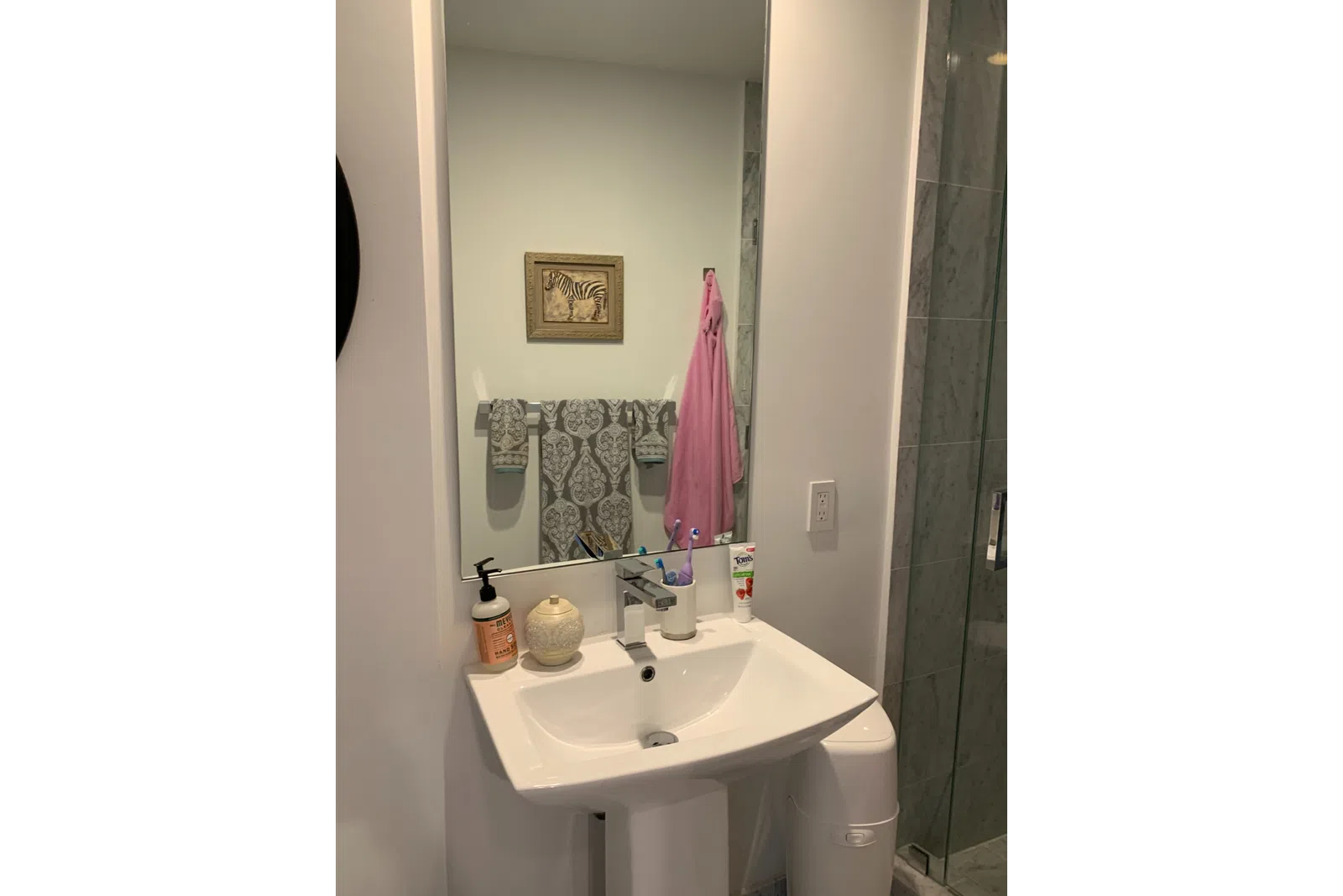 a pink object in a white room