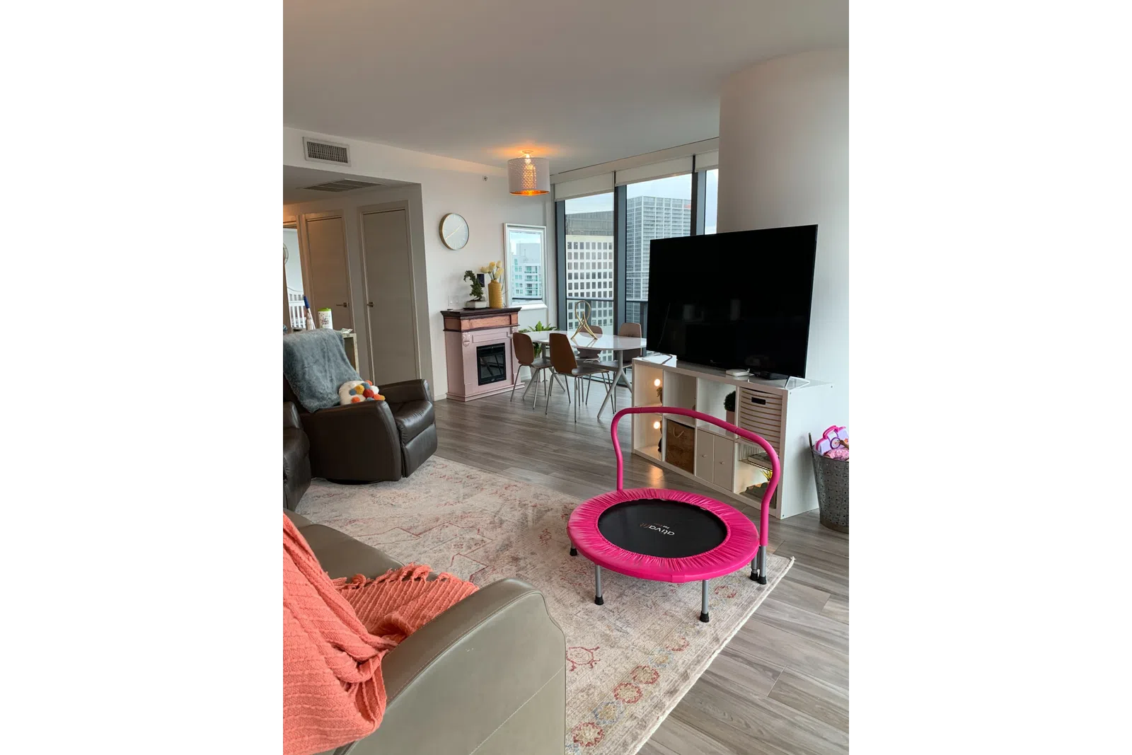a room with a tv and a chair