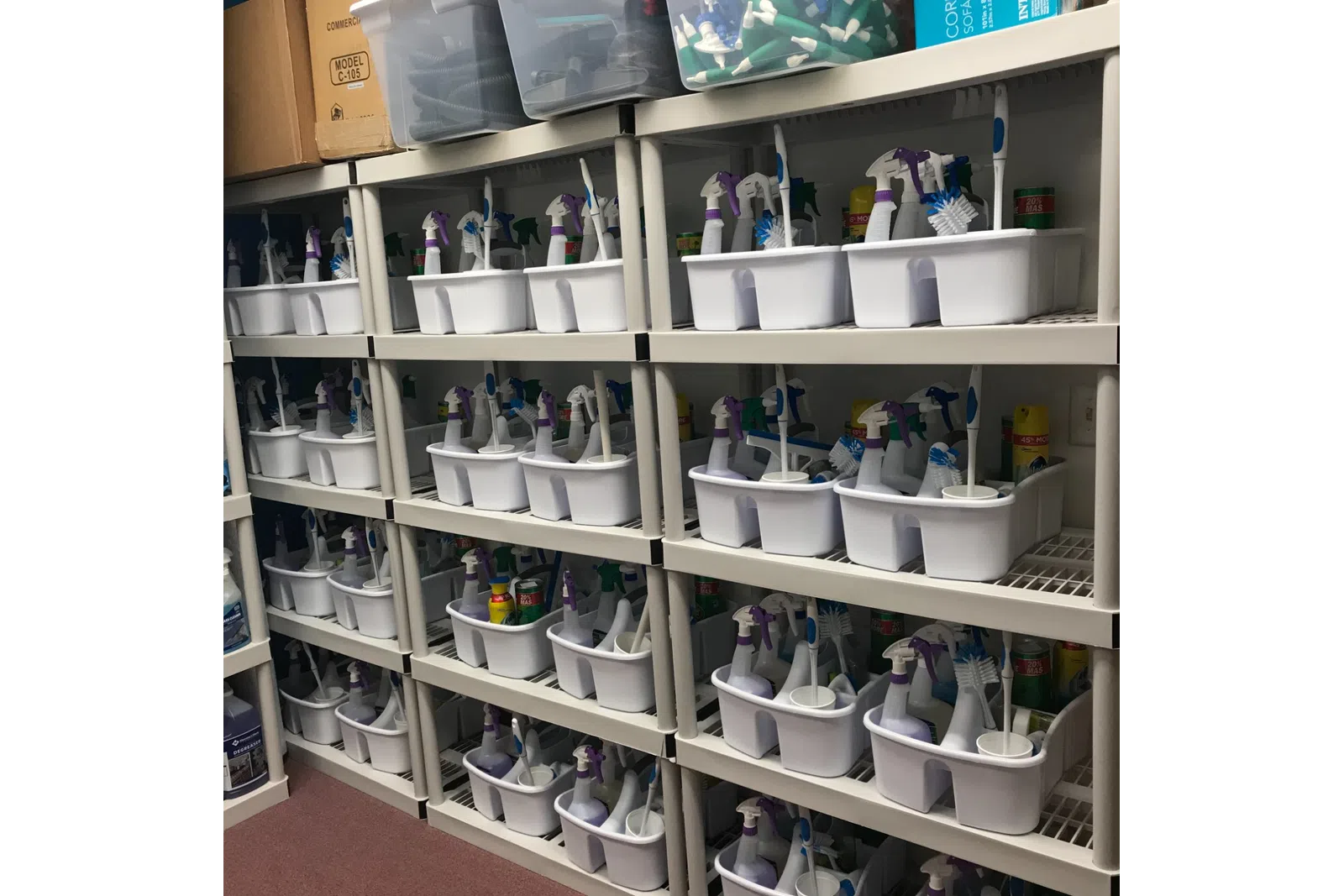 wall of green cleaning supplies used by MaidPro Tyngsborough
