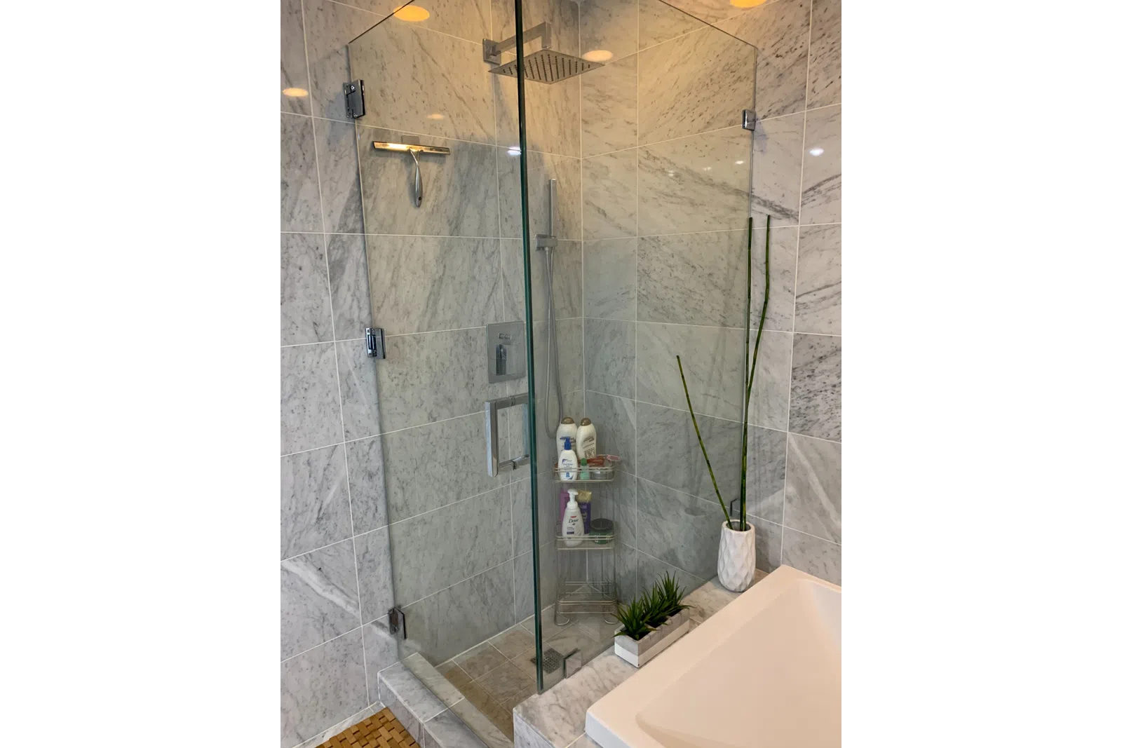a bathroom with a glass shower
