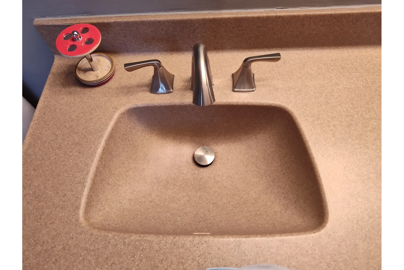 a round metal object with buttons