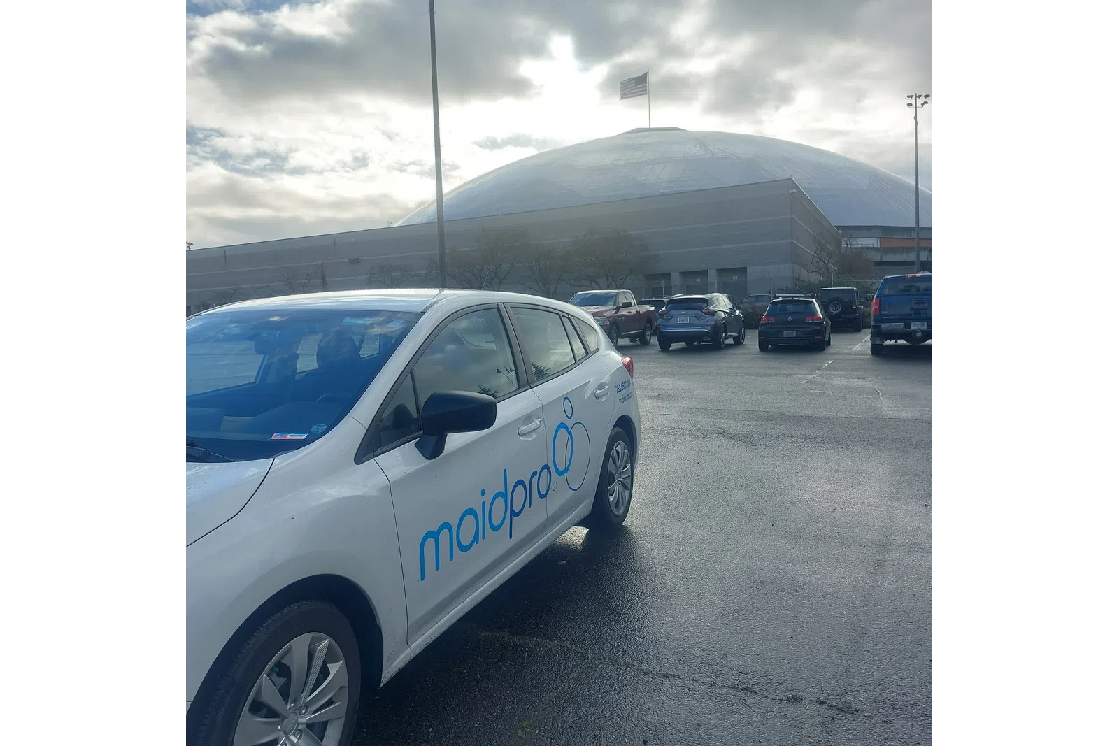 MaidPro branded car parked in lot Tacoma, Washington