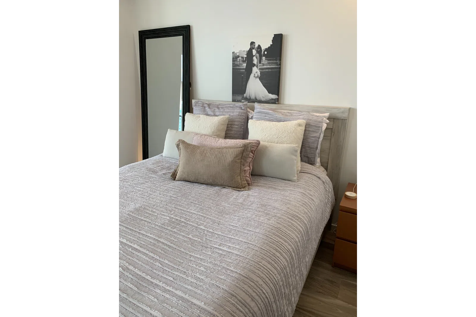a bed with a mirror
