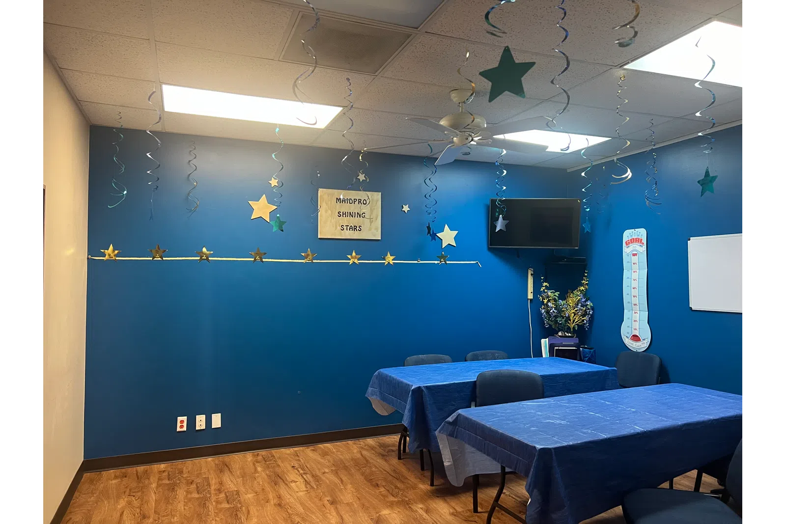 a room with blue beds