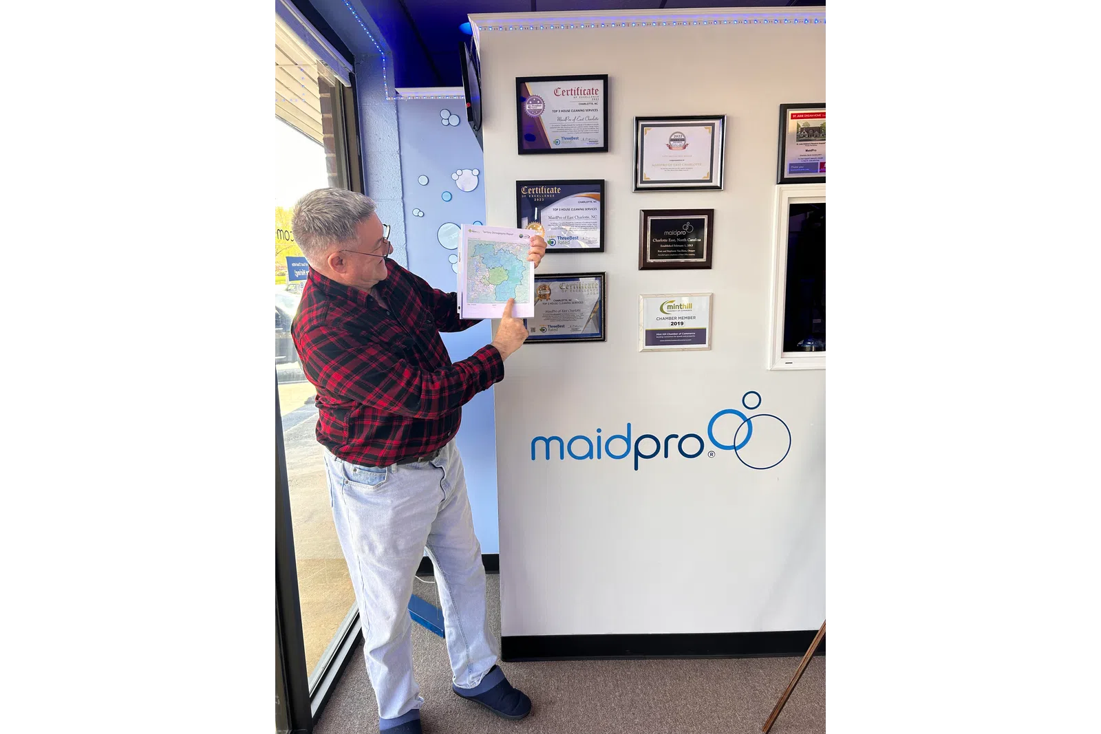 a man holding a piece of paper