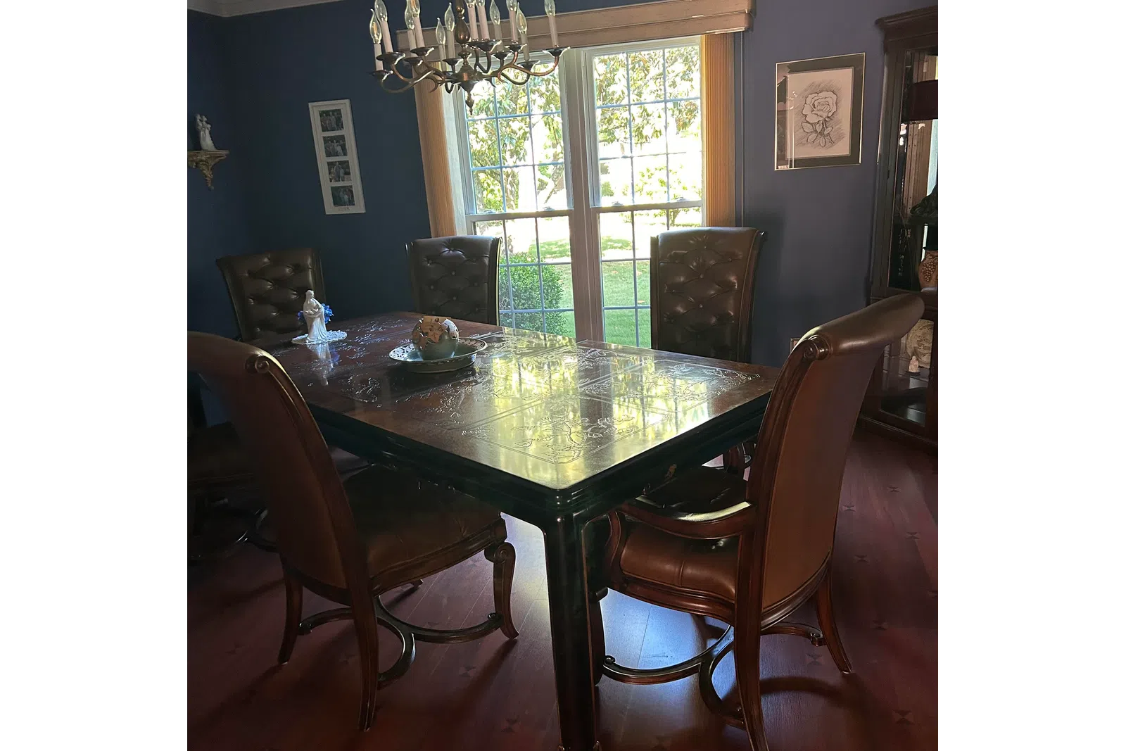 a dining table with chairs around it