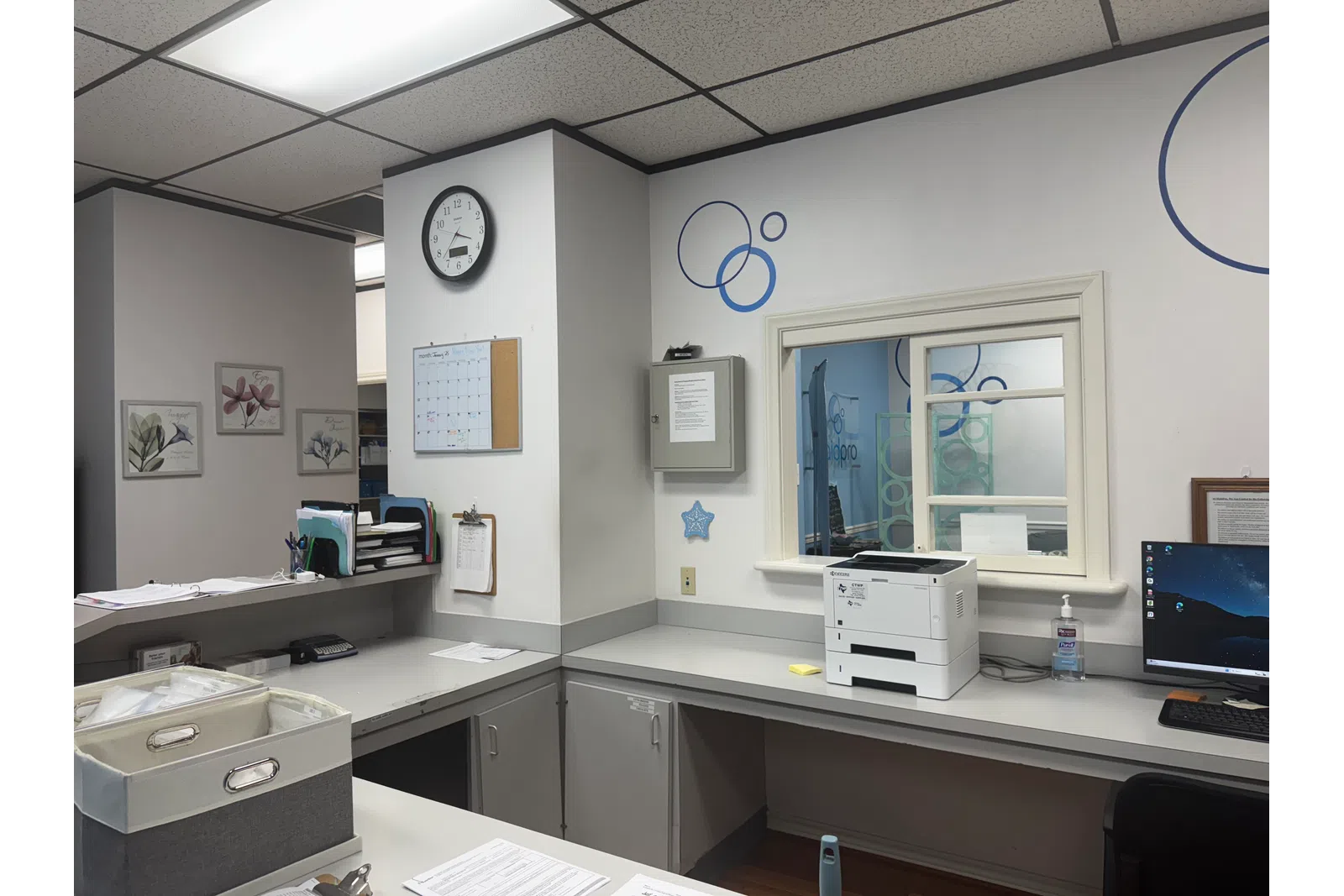 an office with a clock