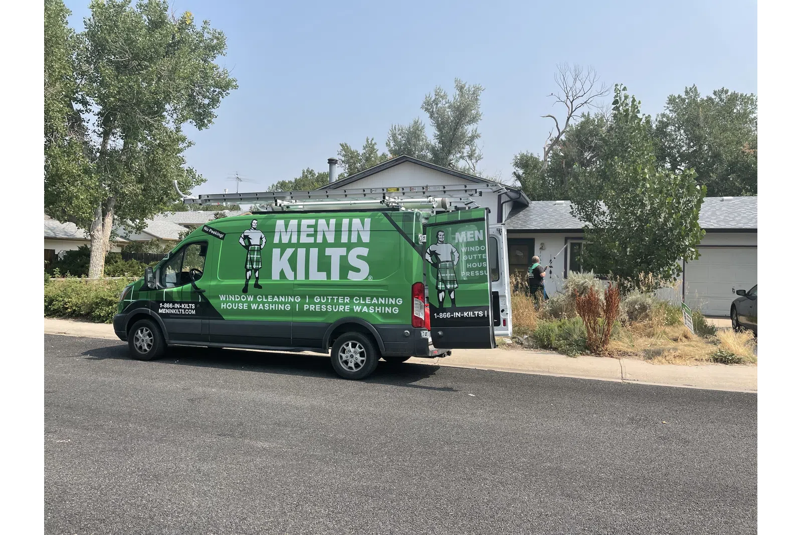 a green truck on the street