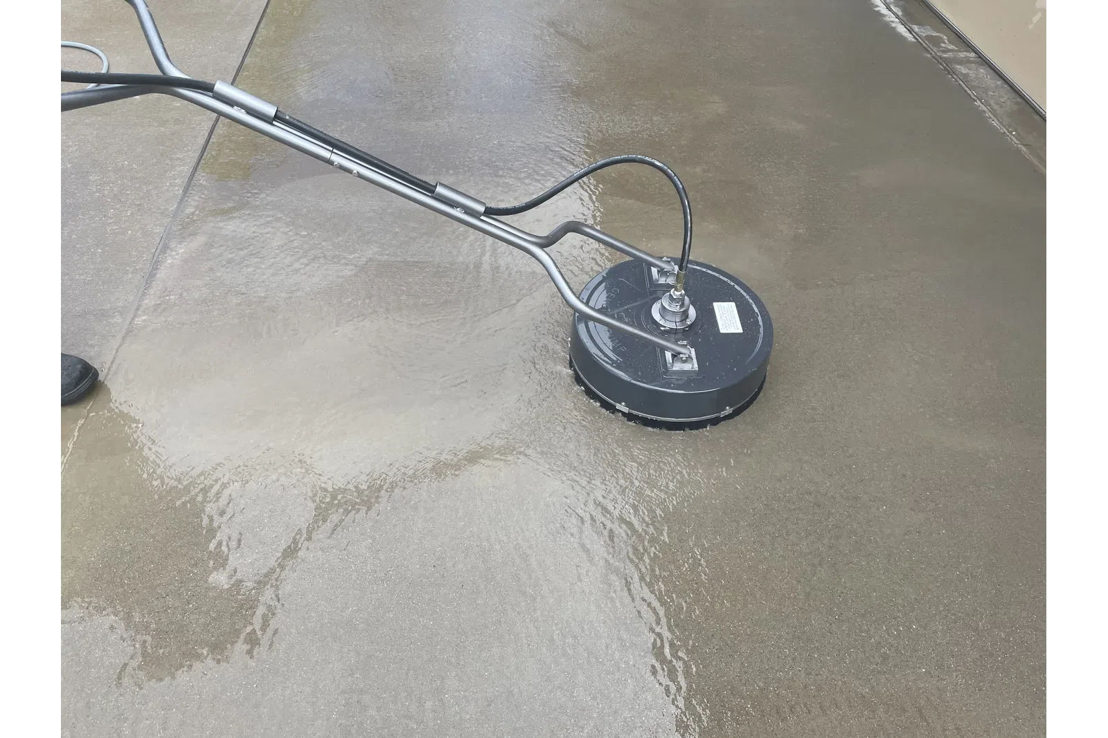 a black and silver object on a grey surface