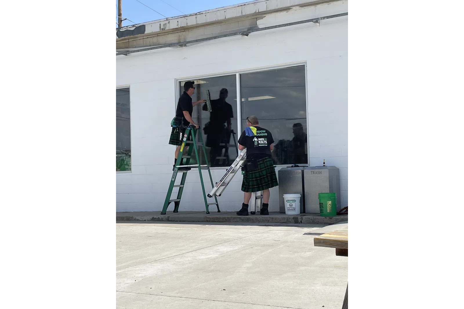a man standing on a ladder