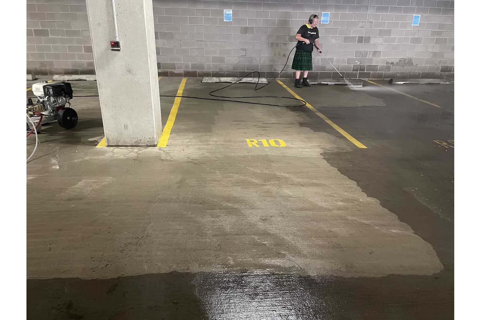 a man walking in a parking lot