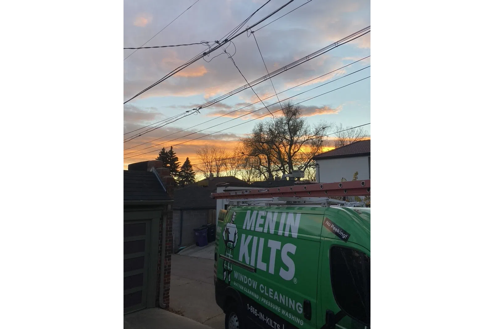 a green van parked on a street
