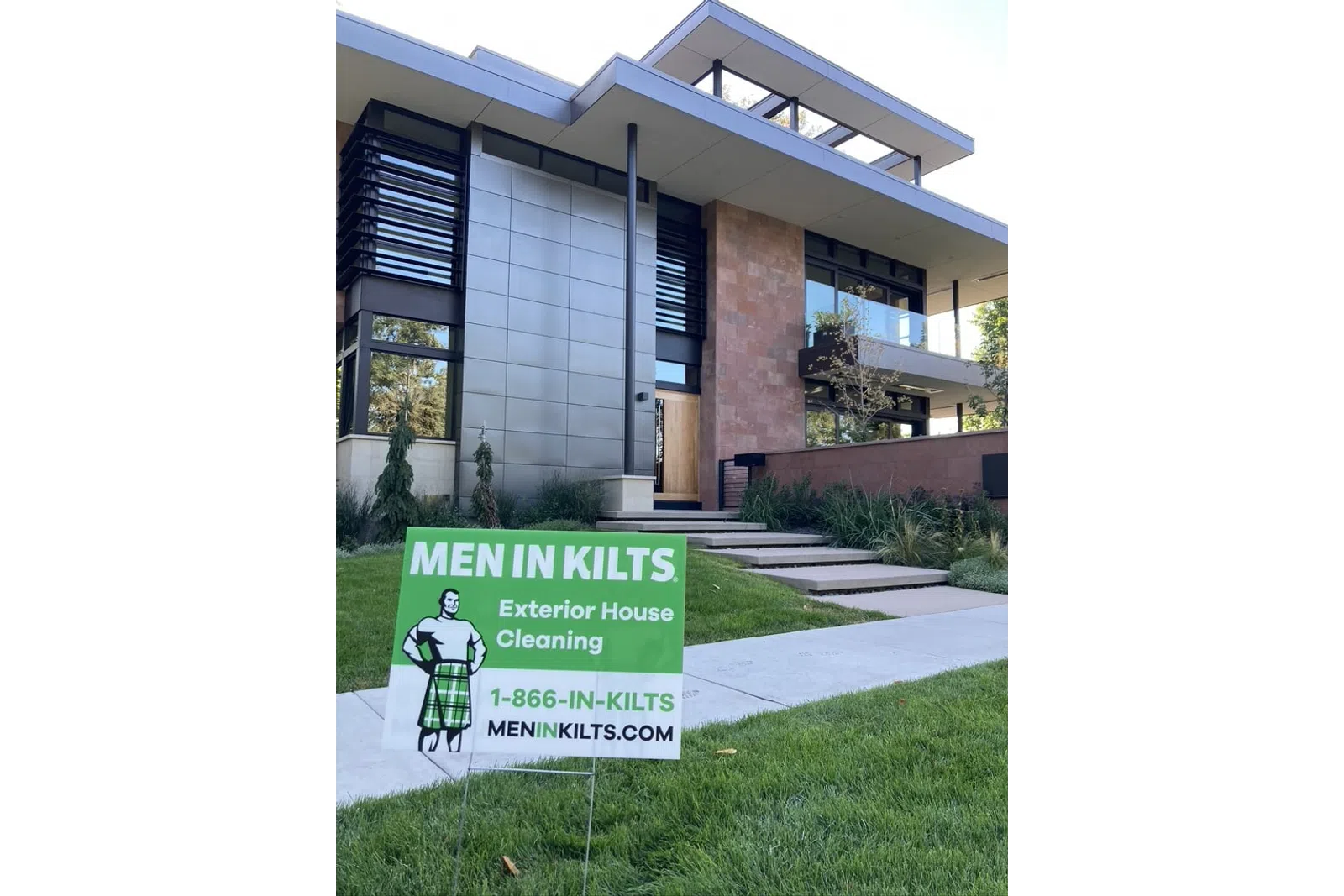 a sign in front of a building