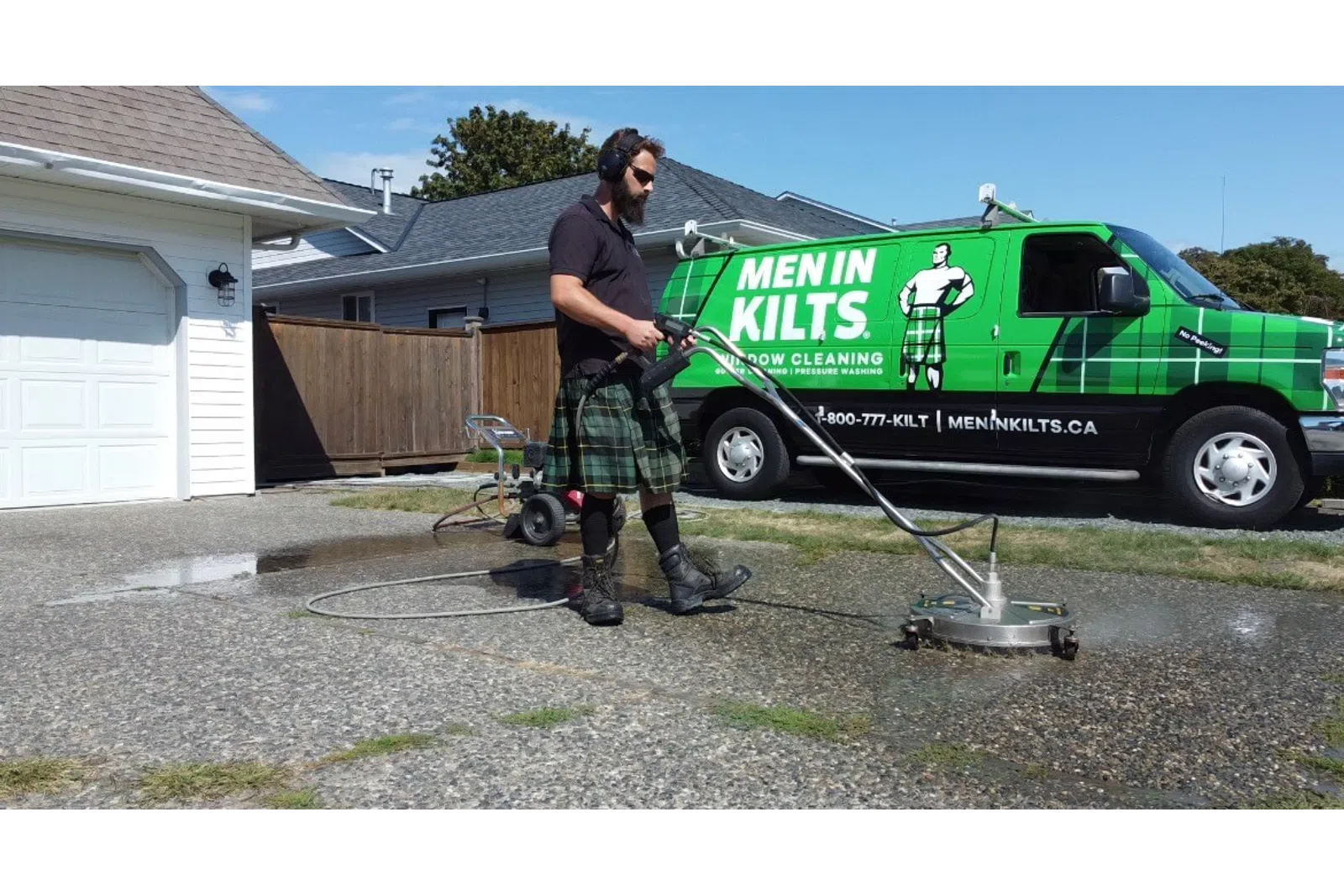 a person holding a large green machine