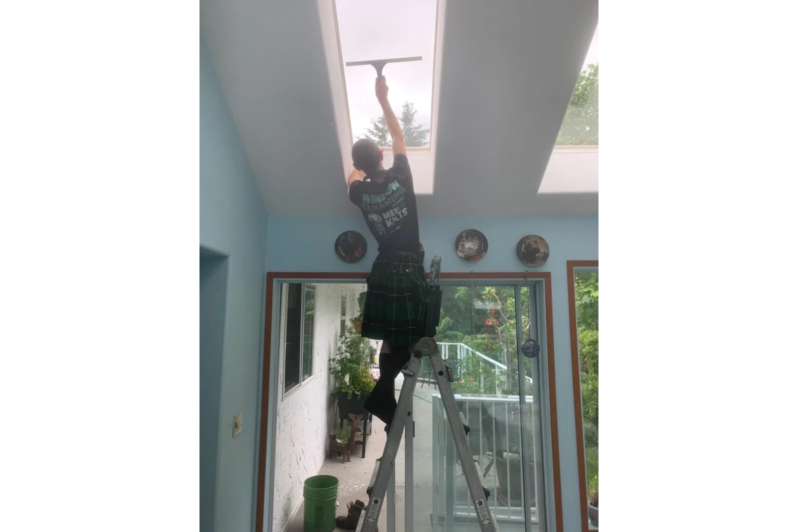 a person standing on a ladder