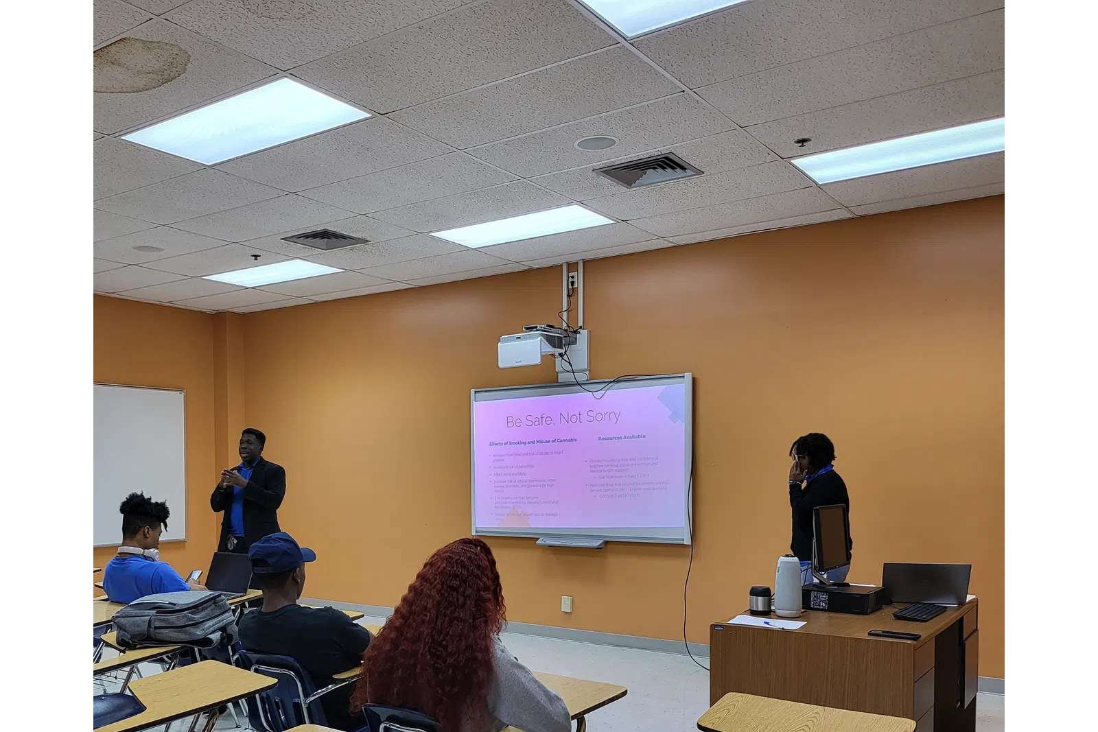 a group of people in a classroom