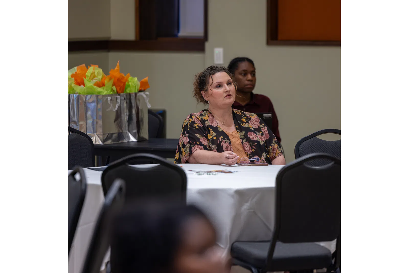 a woman and a man sitting at a table