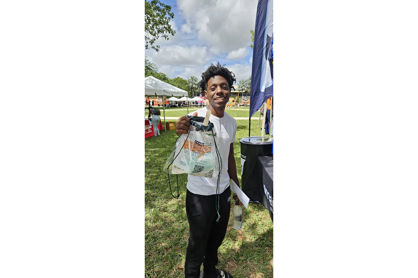 a person holding a bag of food