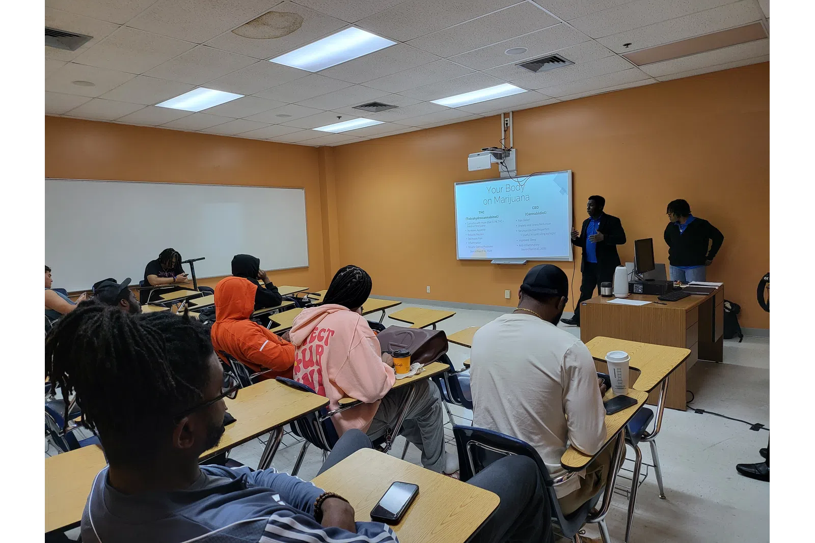 a group of people in a classroom