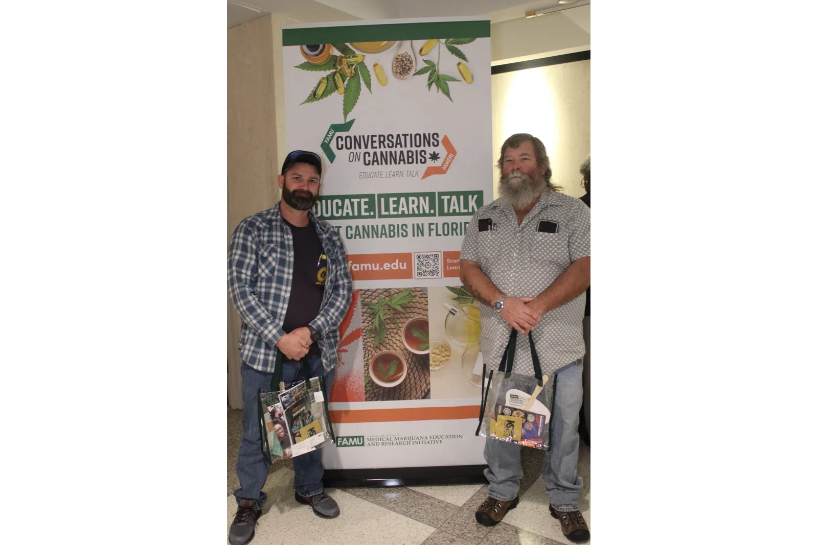 a couple of men posing for a picture