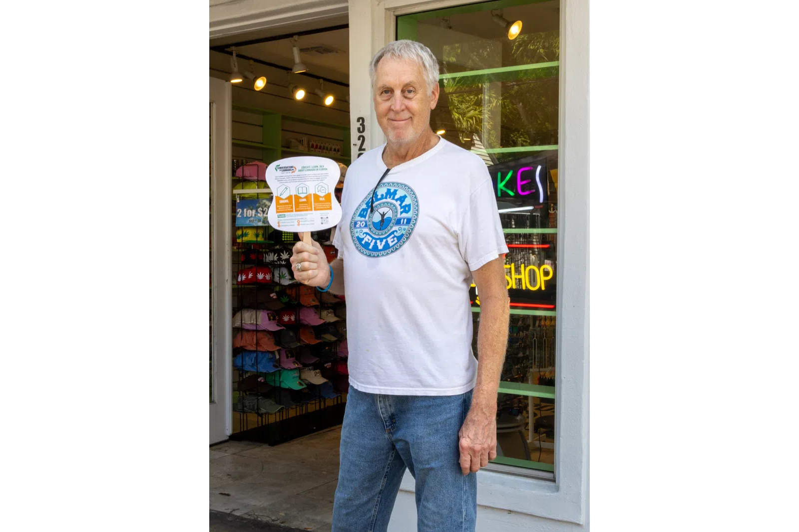 a man holding a sign