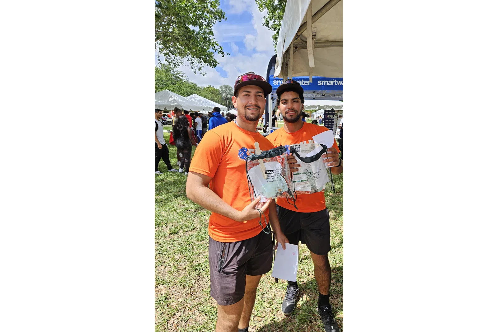a couple of men posing for a picture