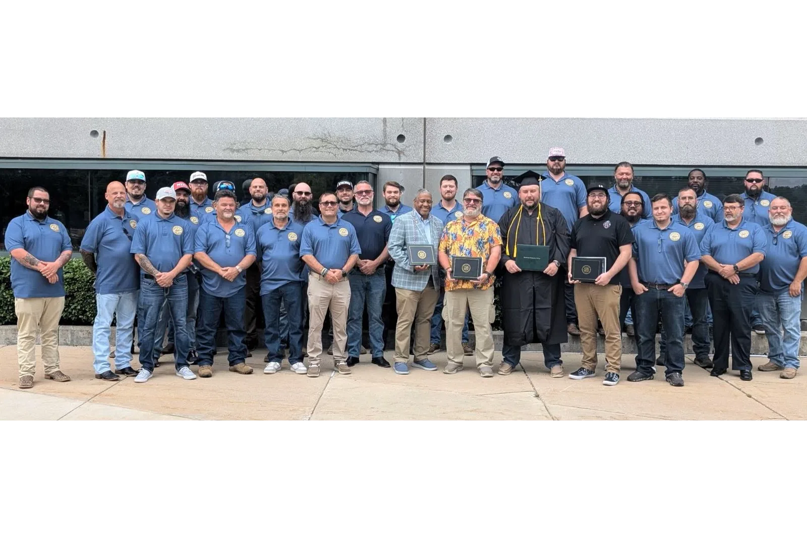 a group of men posing for a photo
