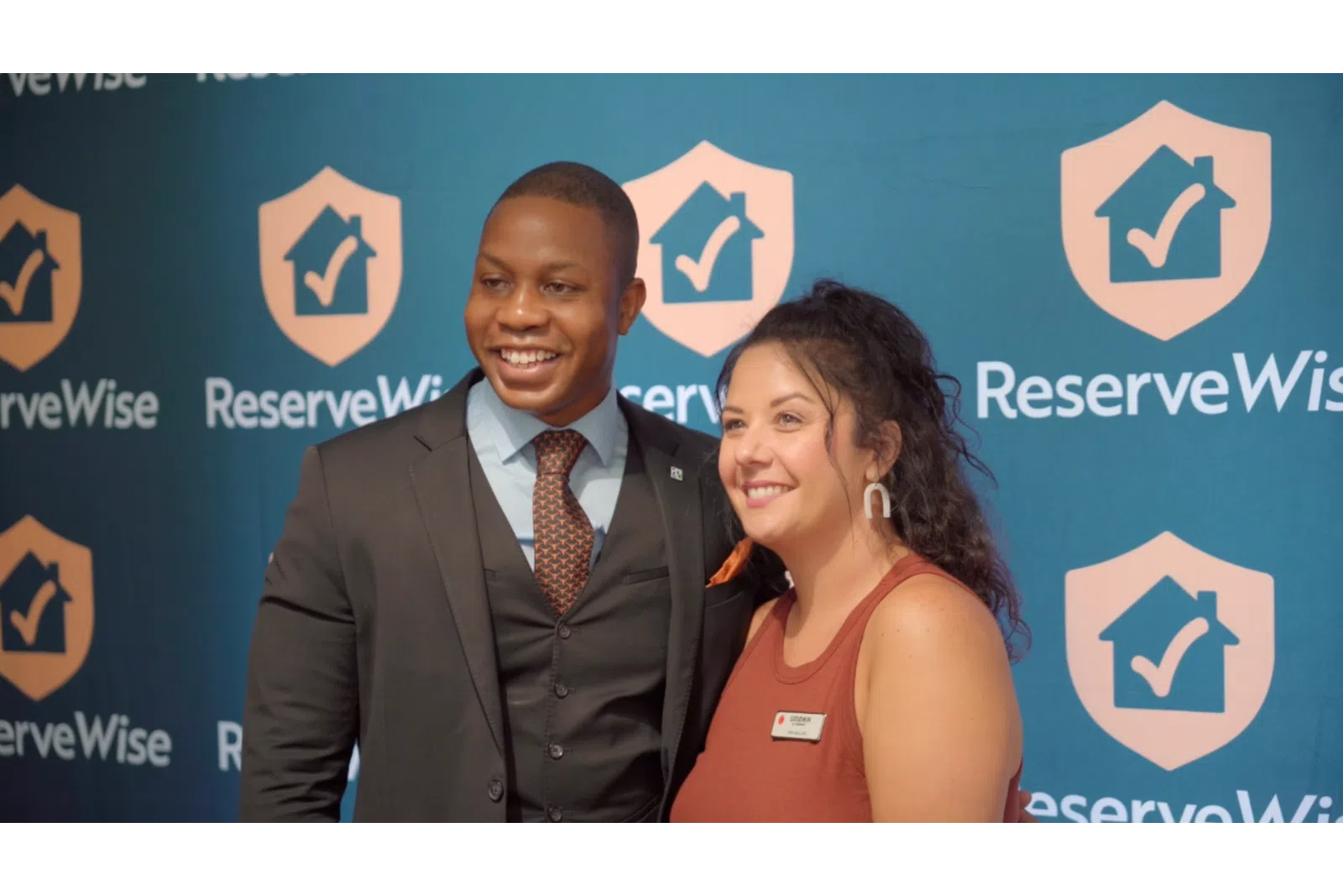 a man and woman smiling