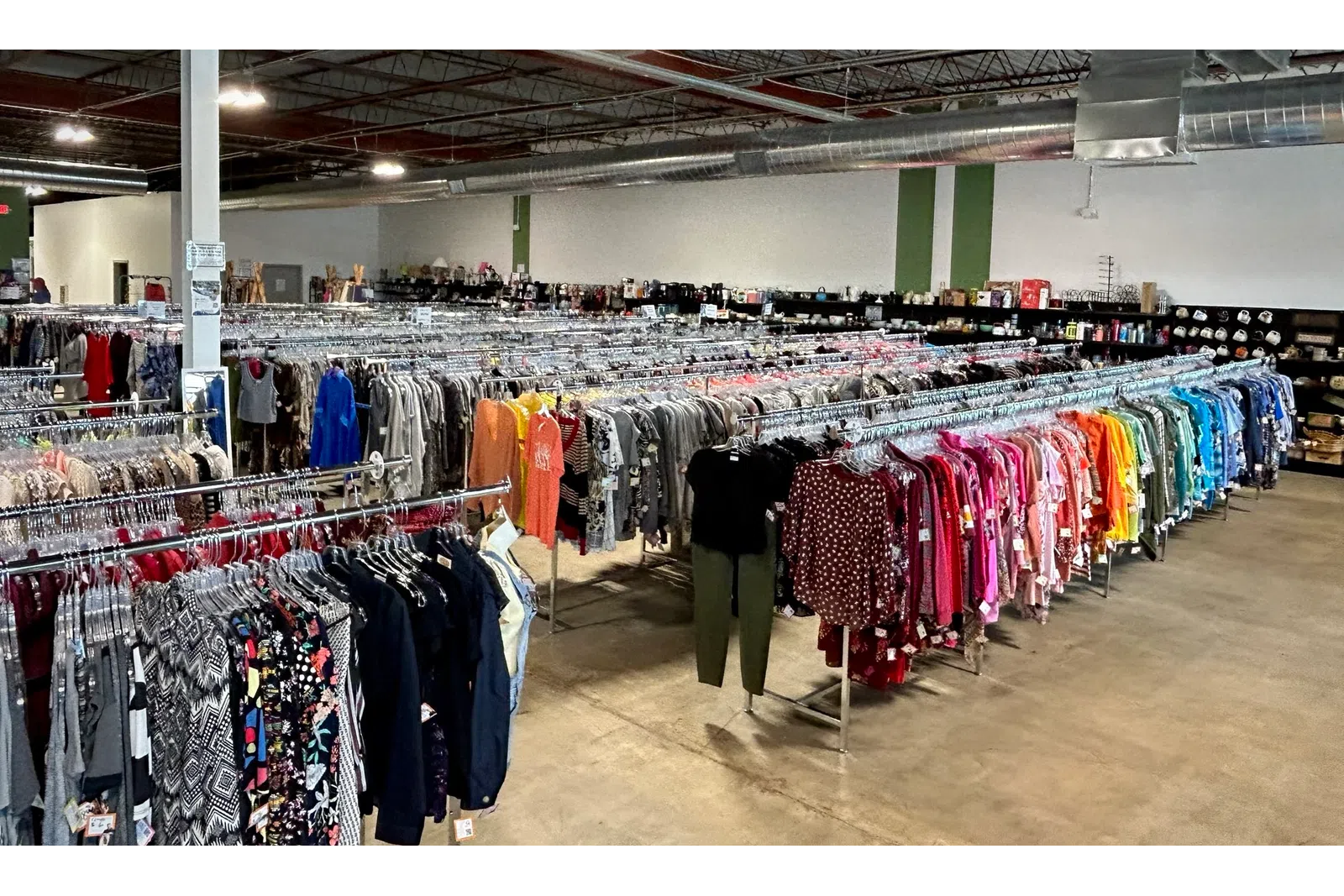 a store with a large display of clothes