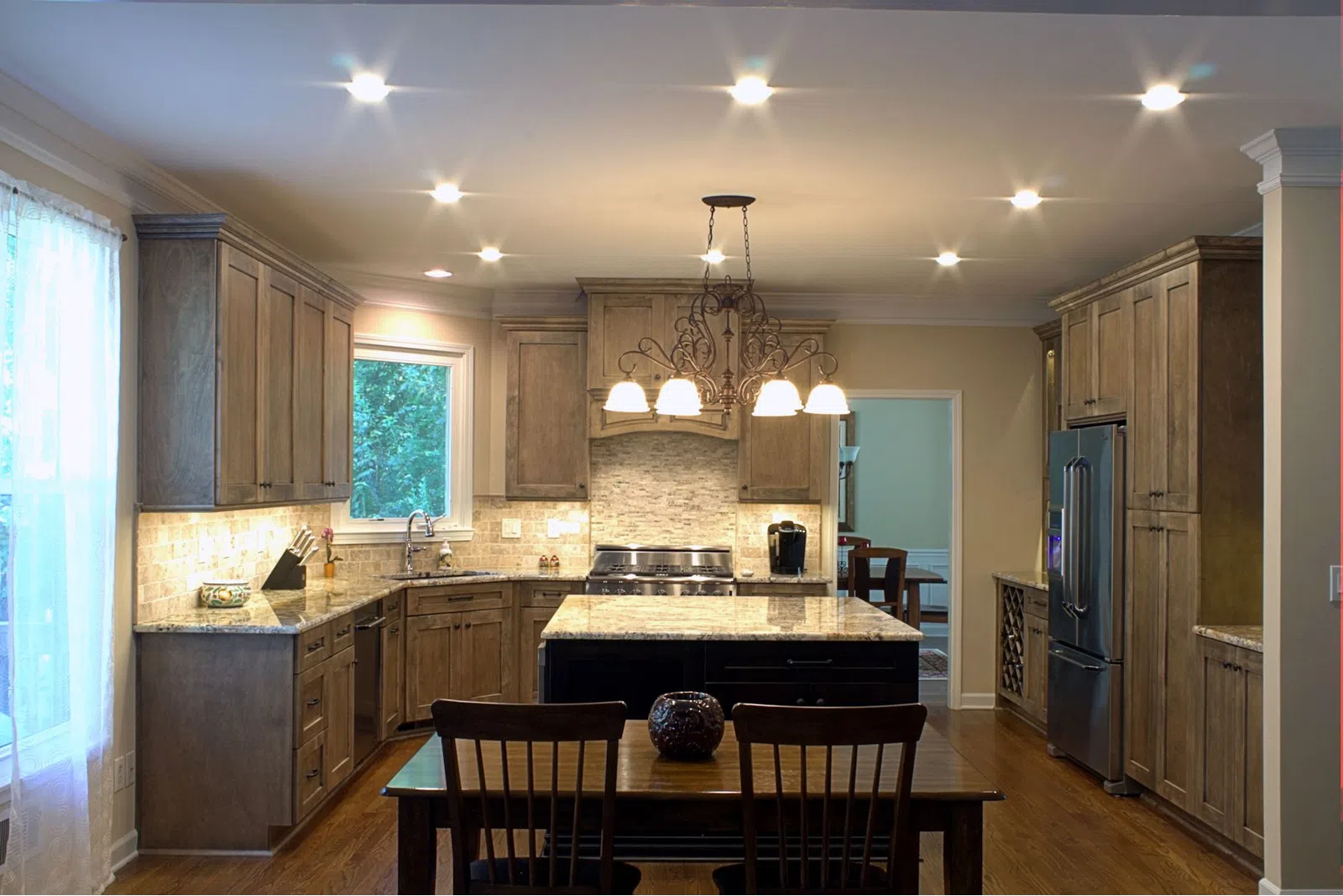 a kitchen with a dining room table