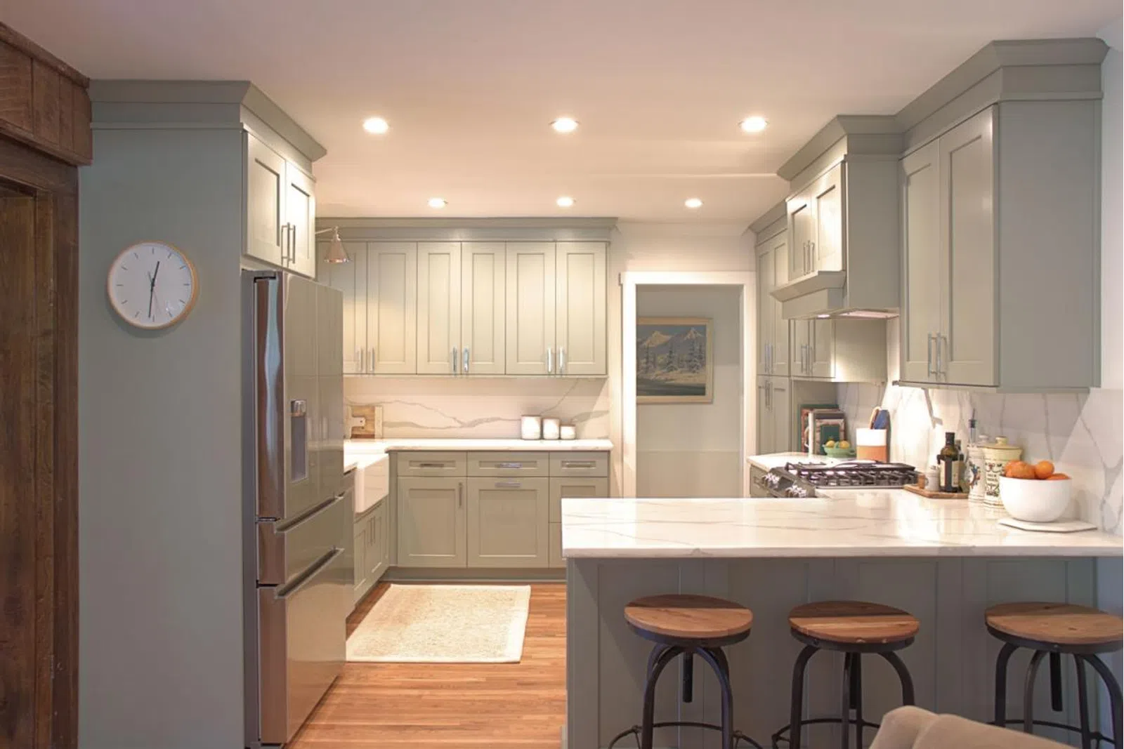 a kitchen with an island in the middle of a room