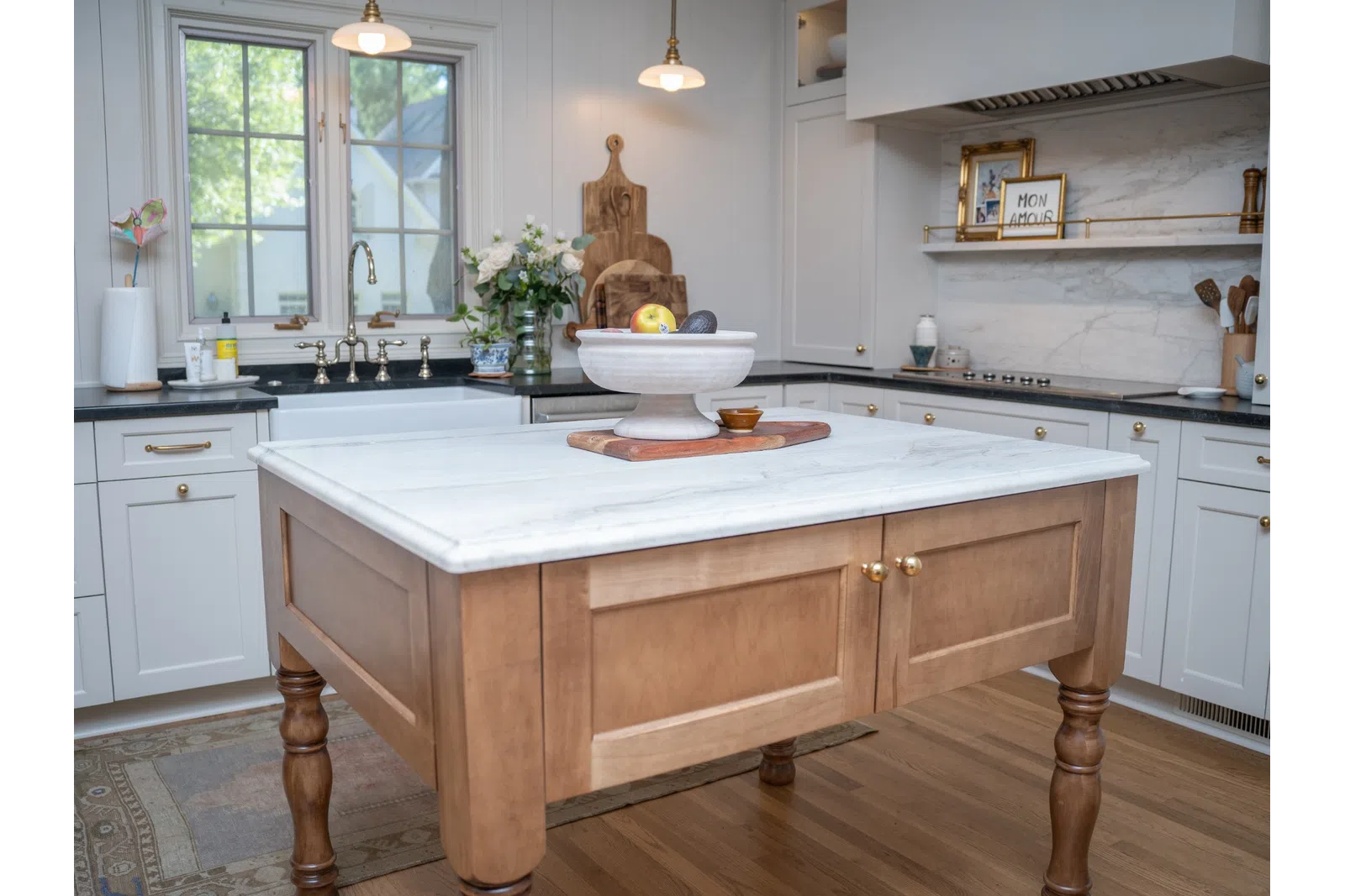 a kitchen with white cabinets