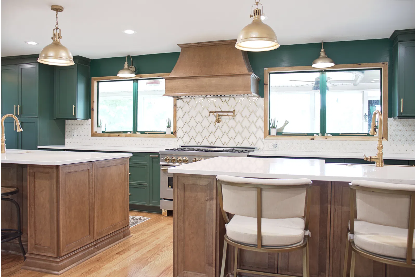 a kitchen with green cabinets
