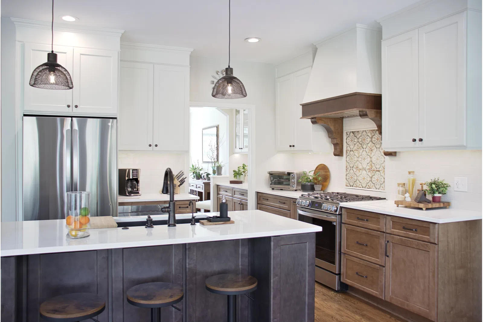 a kitchen with white cabinets