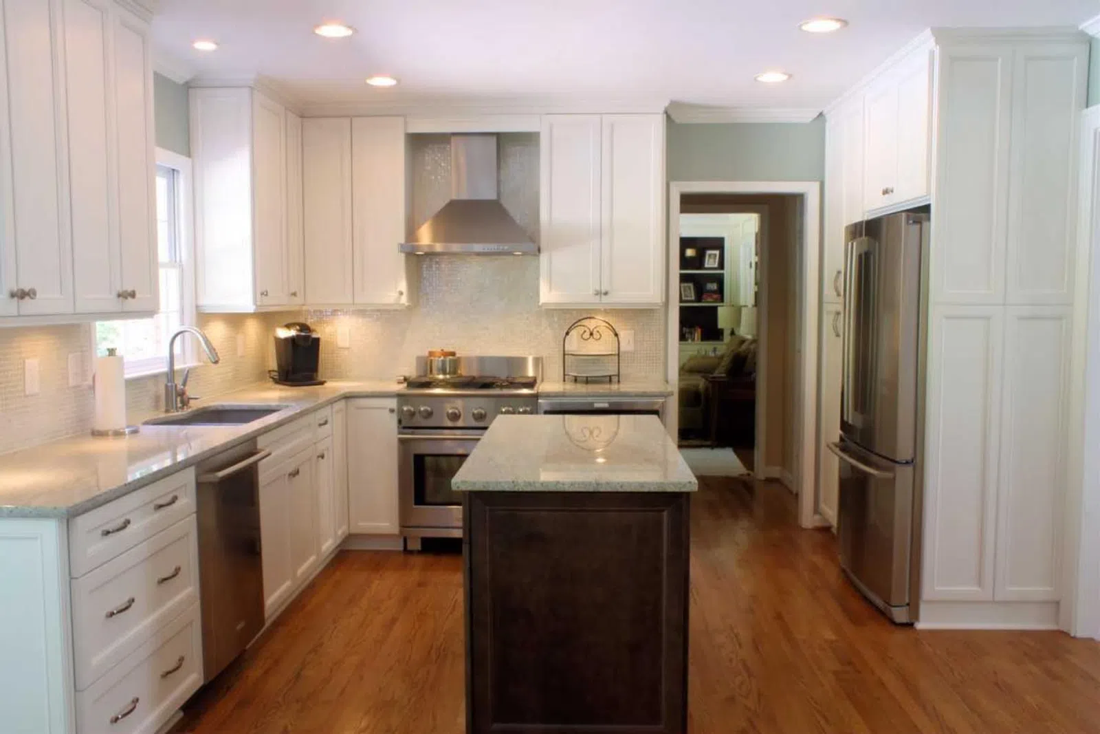 a kitchen with a wood floor