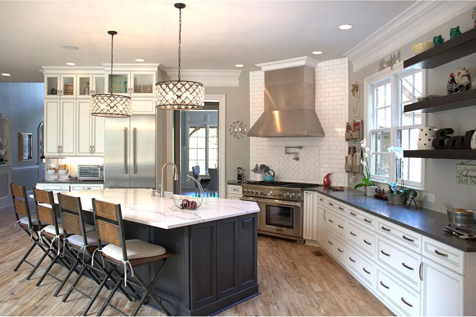 a kitchen with an island in the middle of a room