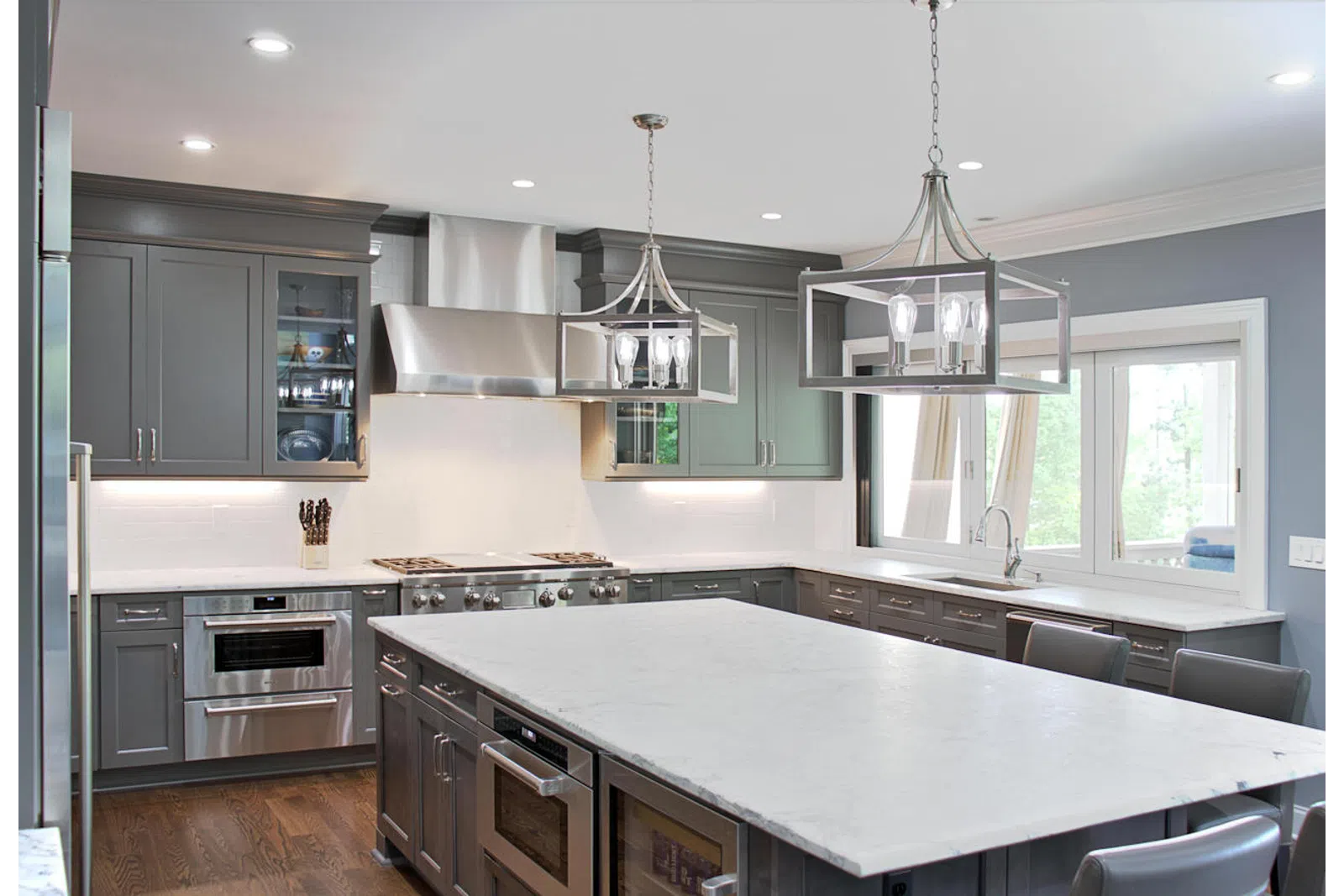 a modern kitchen with stainless steel appliances