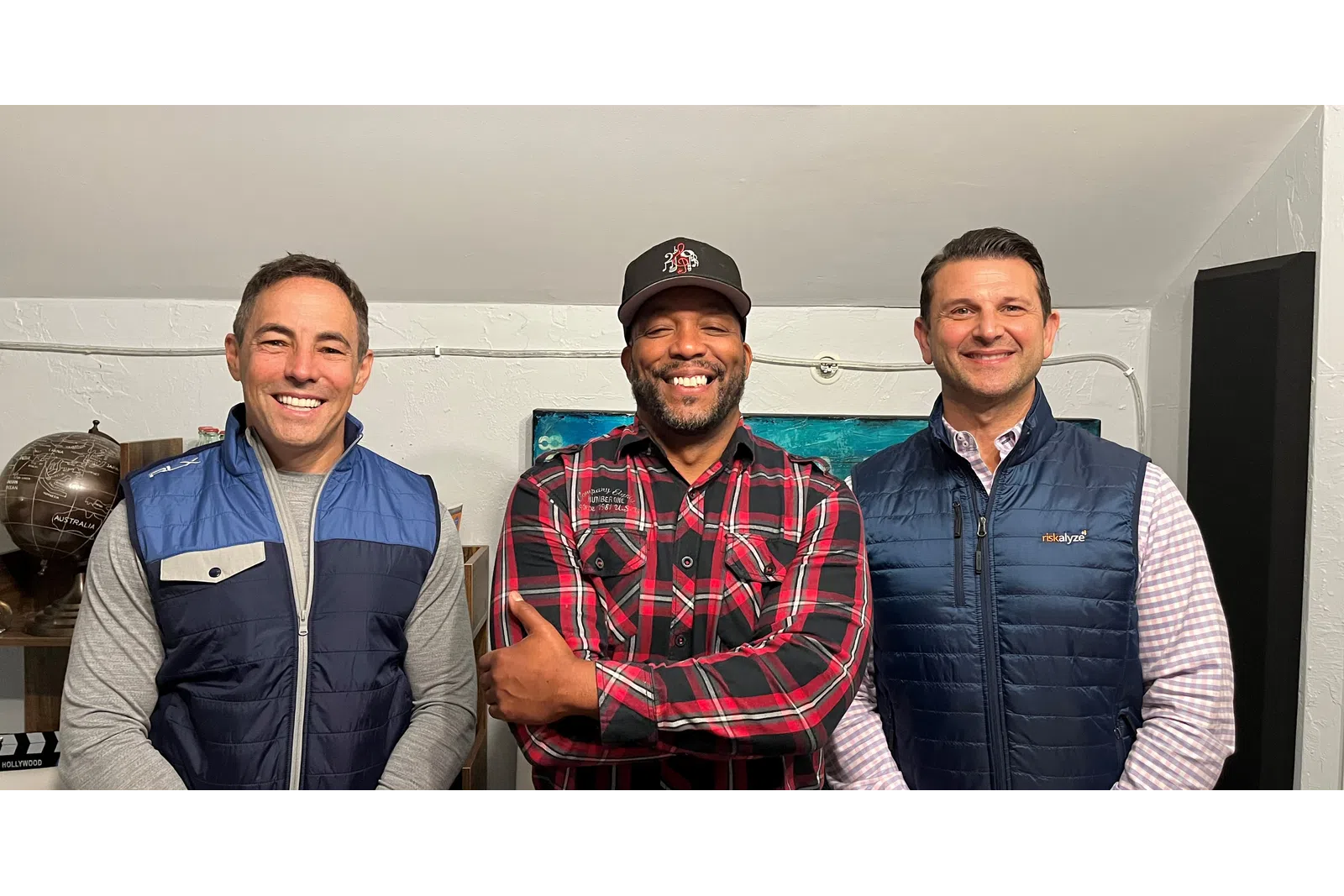 a group of men smiling
