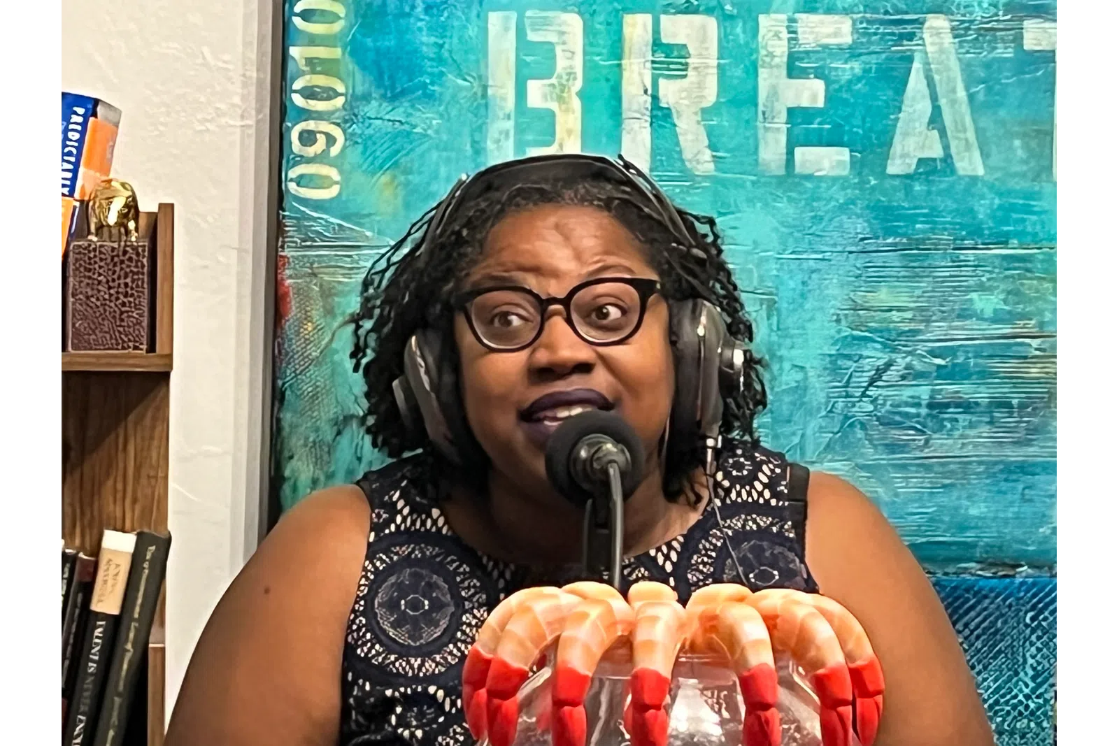 a woman wearing headphones and a microphone