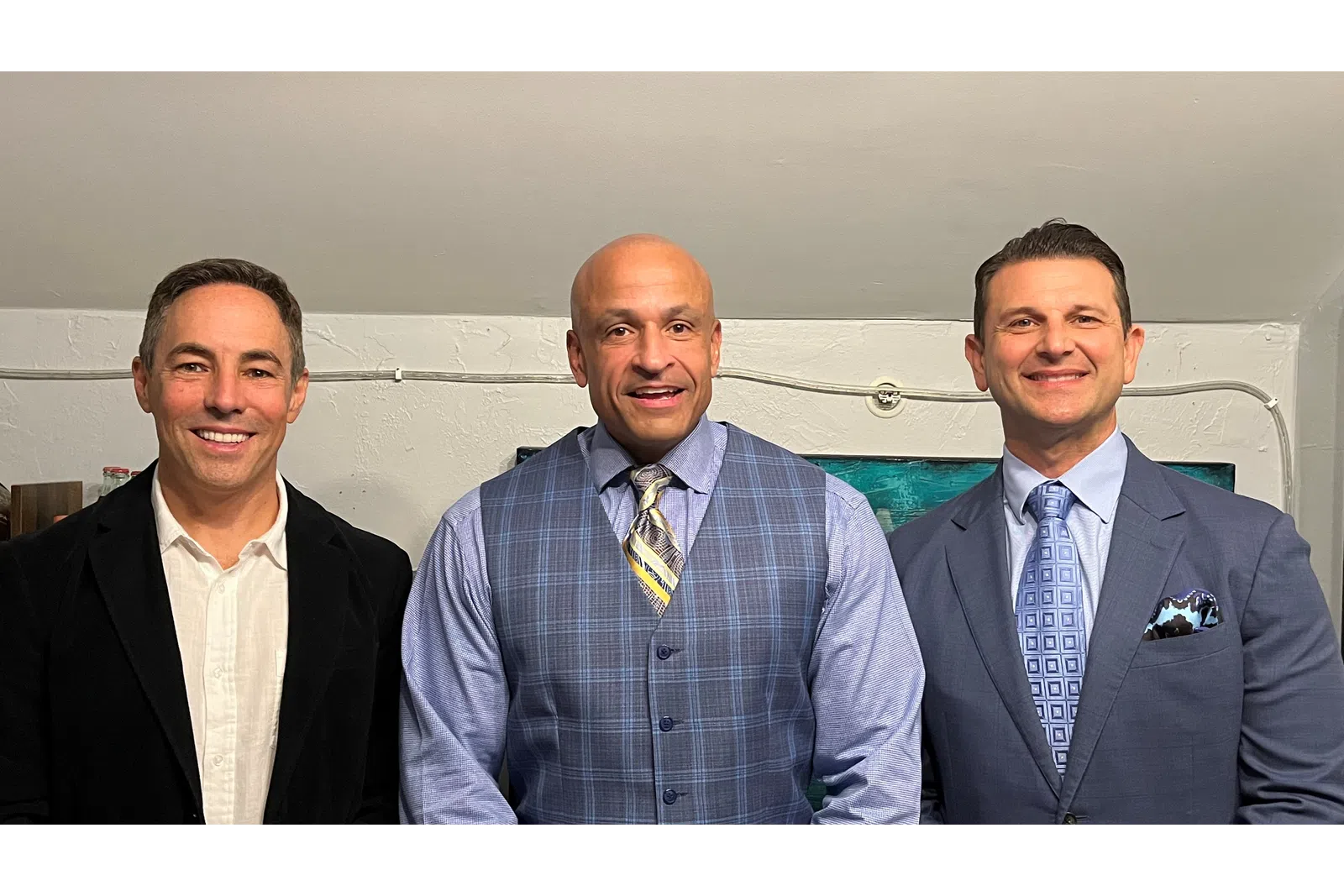 a group of men in suits