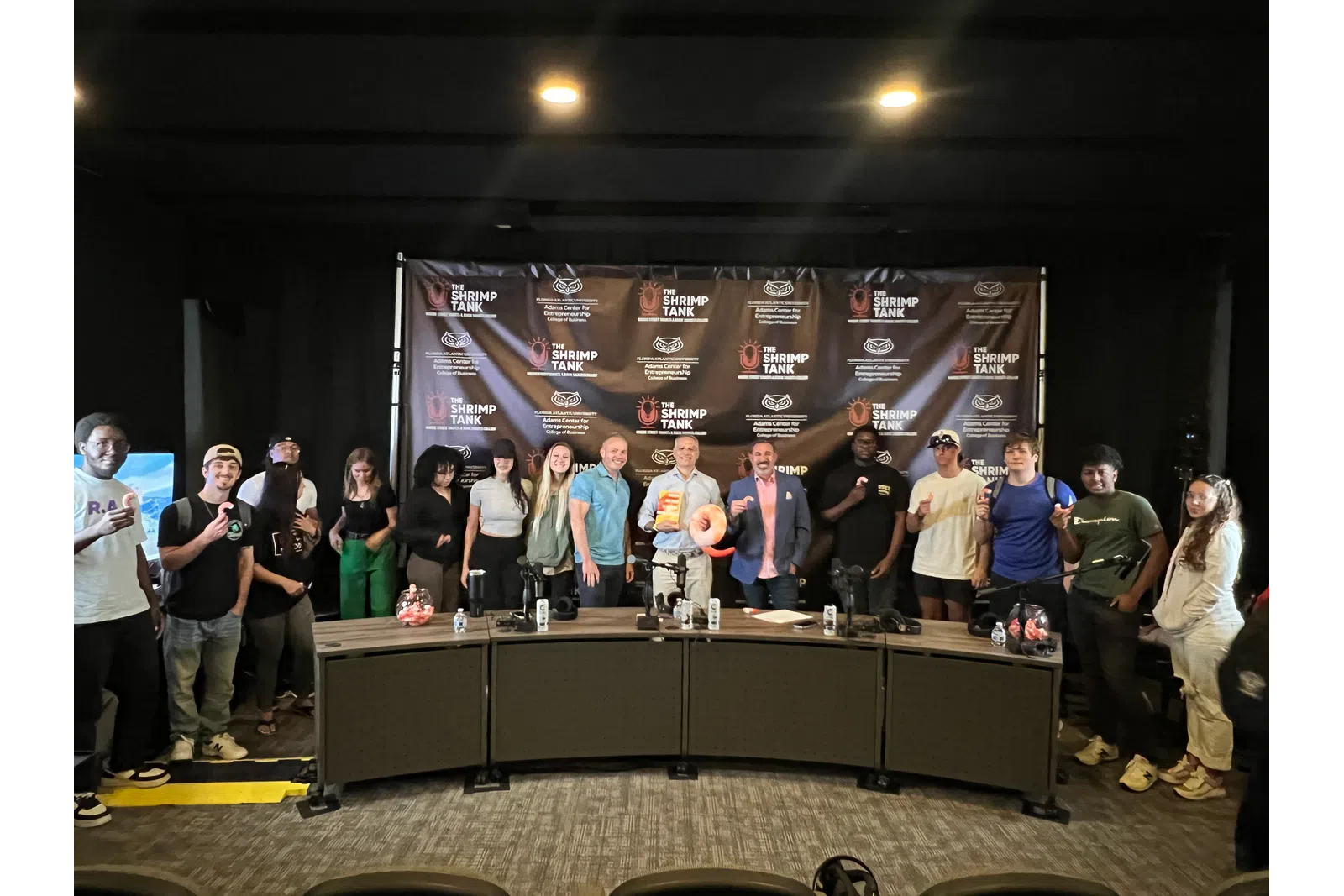 a group of people standing on a stage