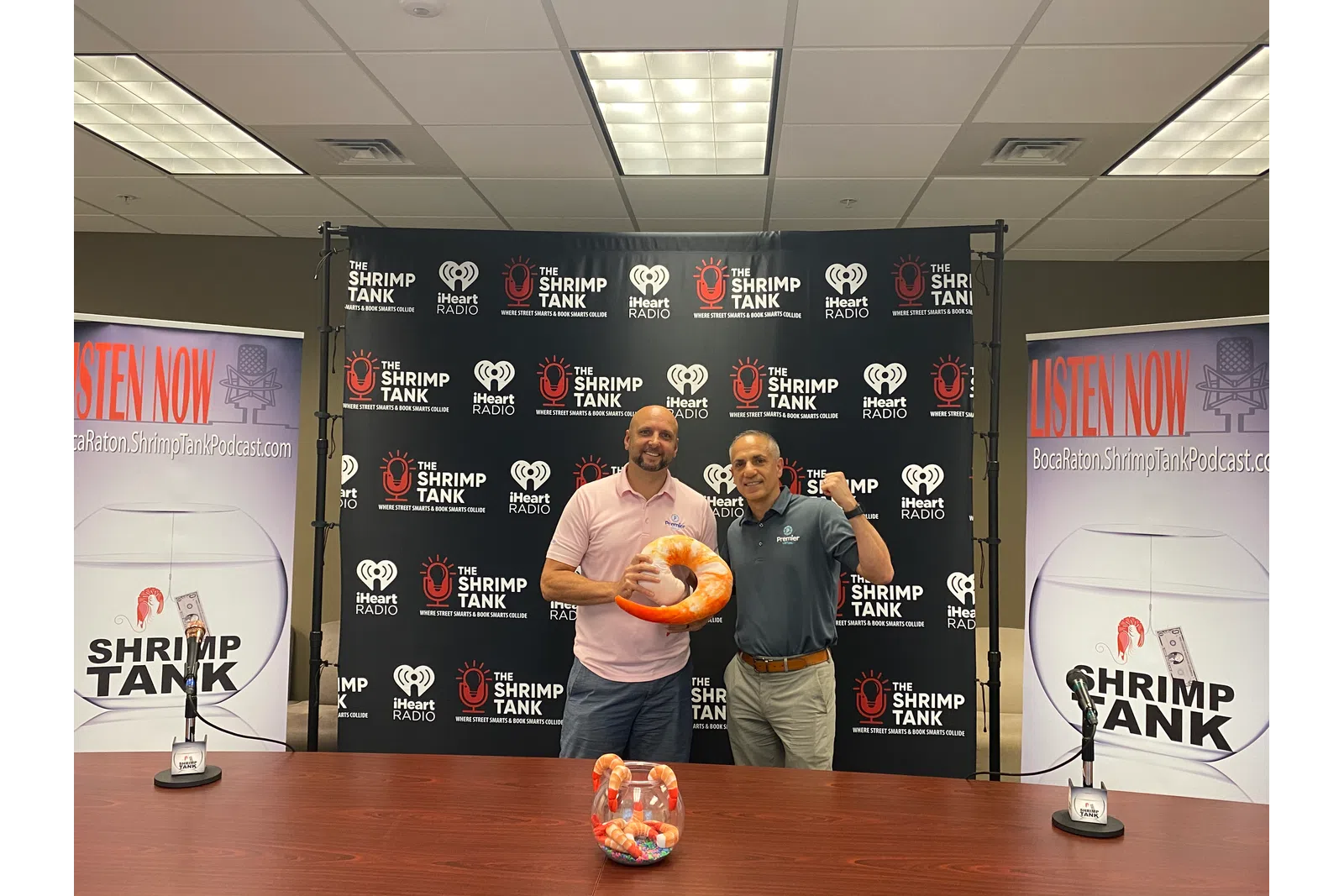 a couple of men holding a basketball