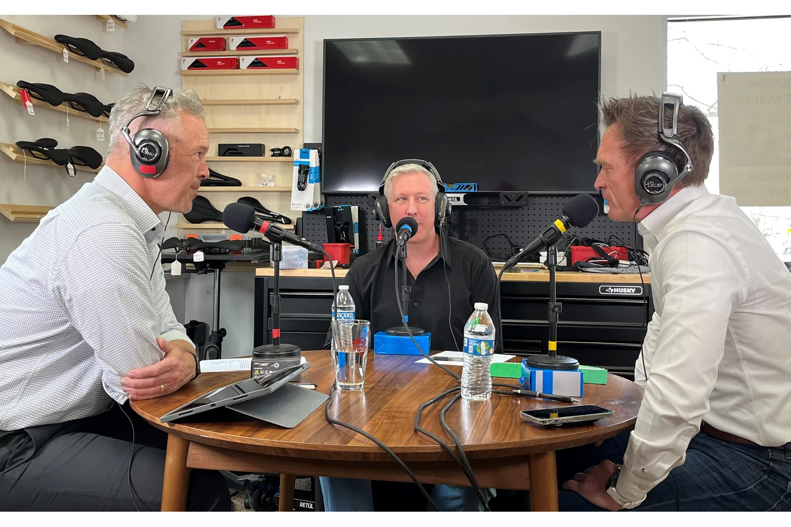 a group of men wearing headphones