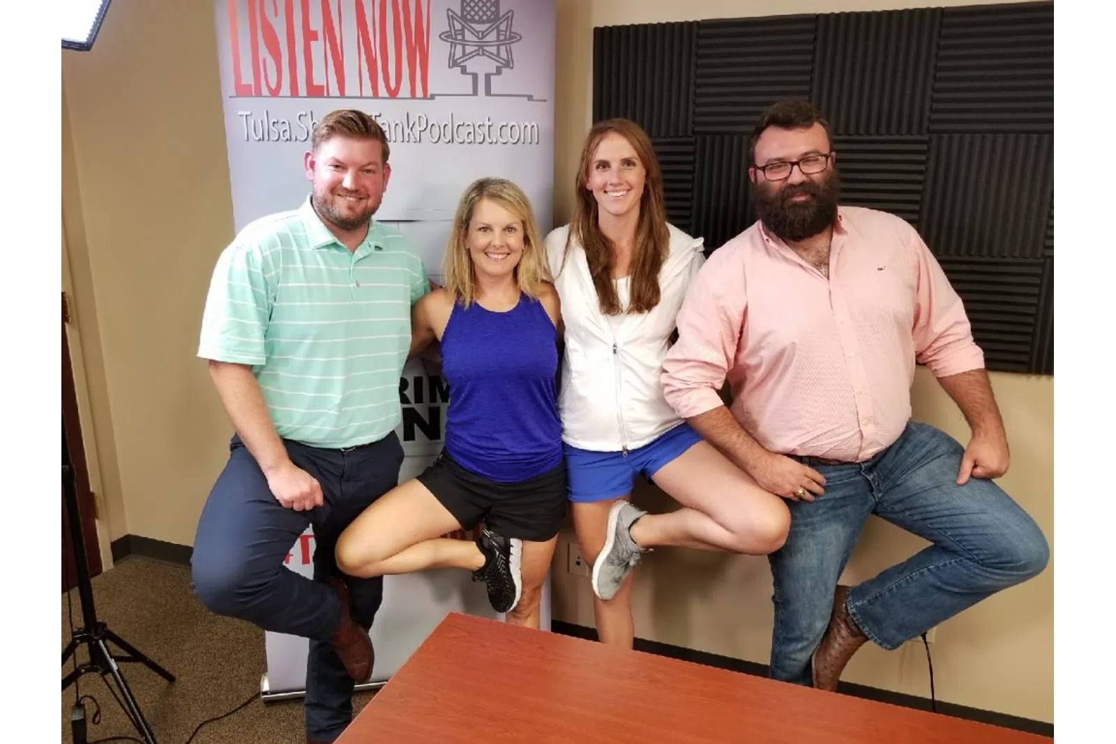a group of people posing for a photo