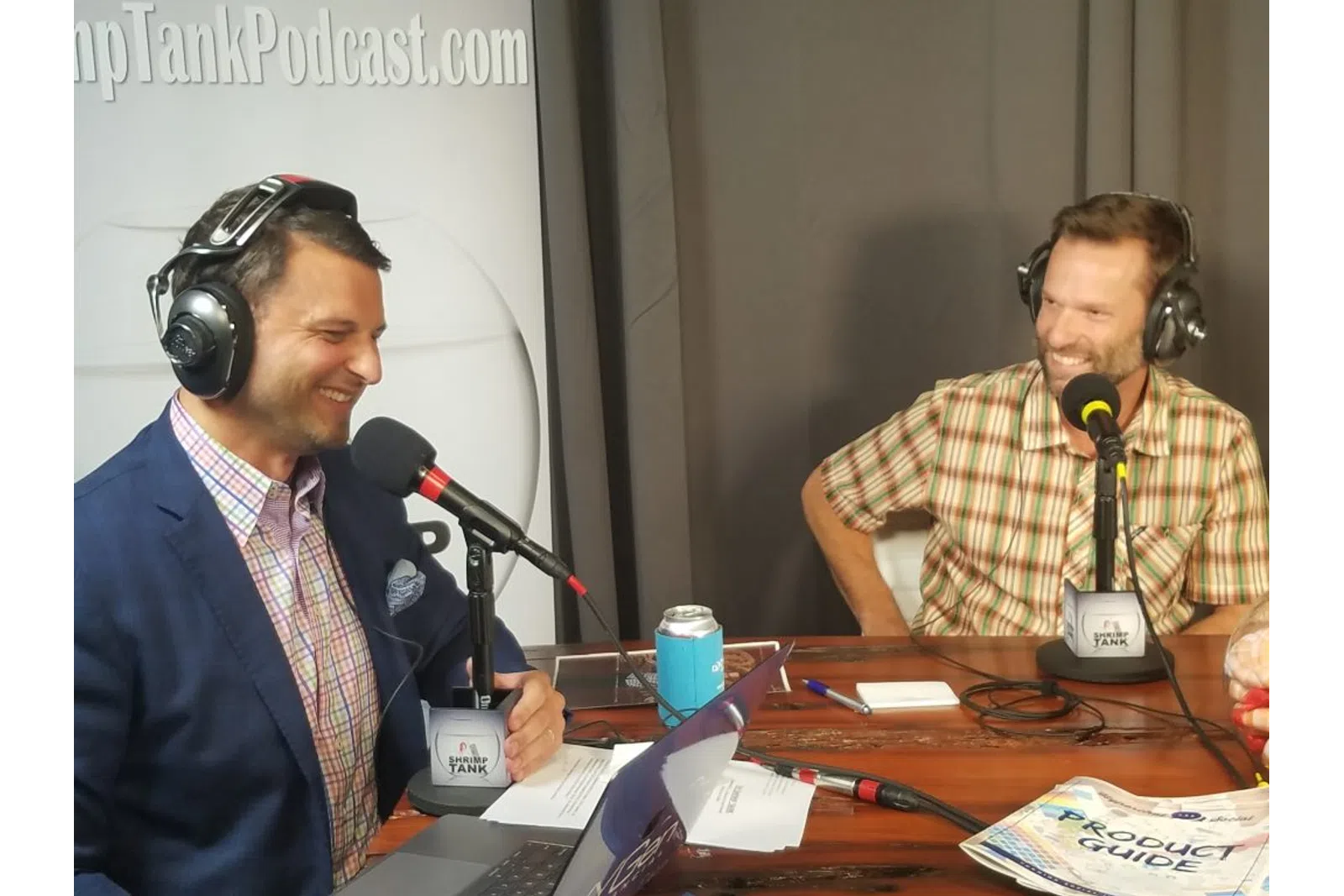 a couple of men wearing headphones