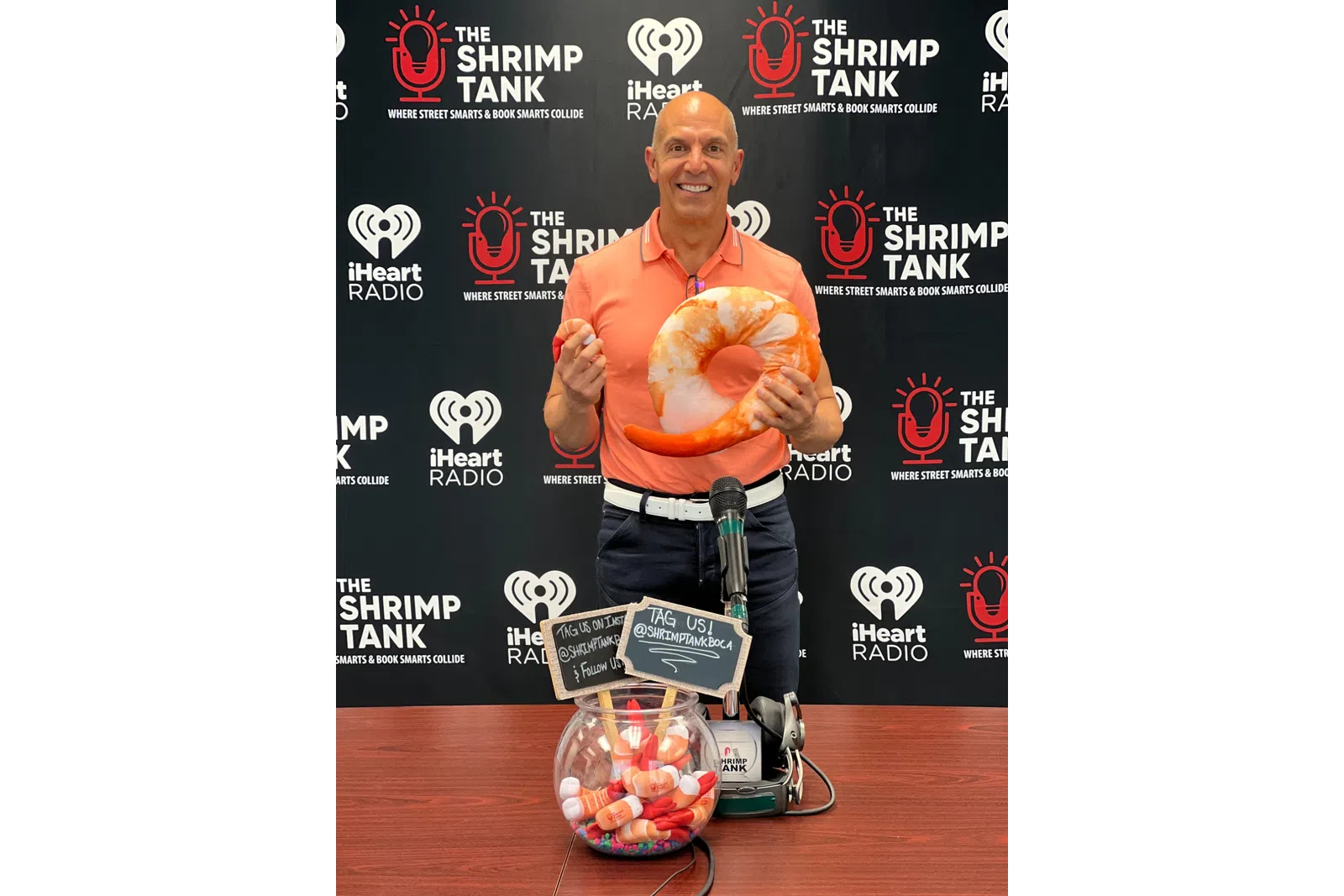 a person holding a large orange ball
