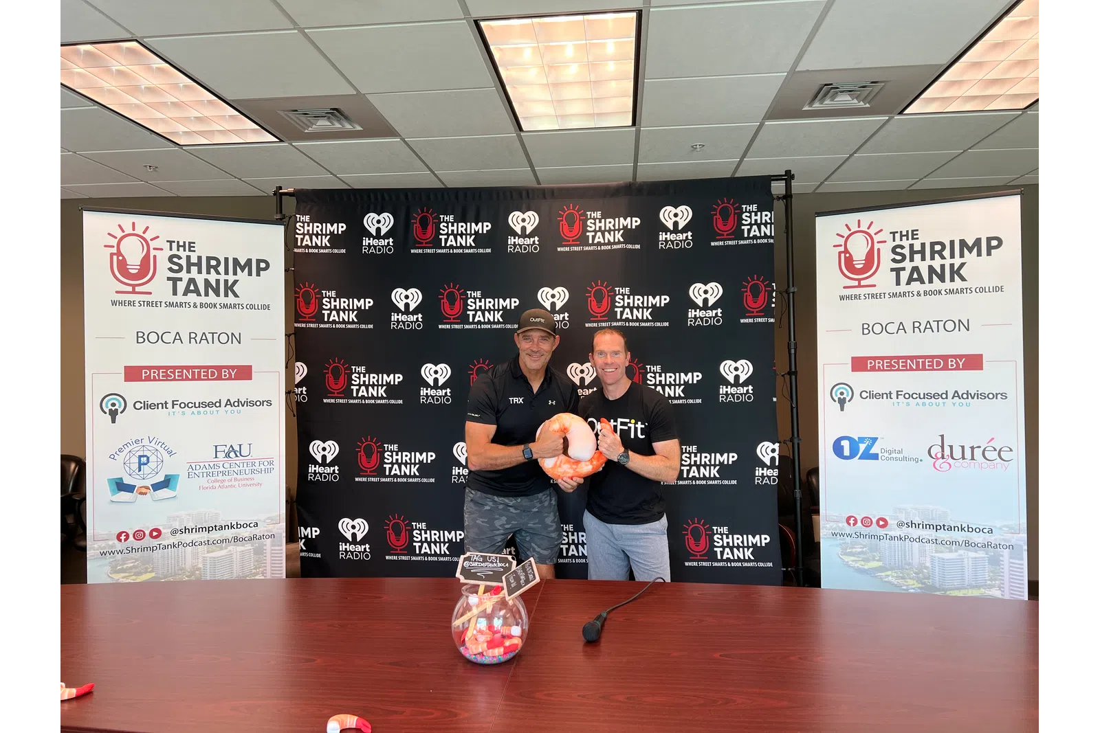 a couple of men holding a ball